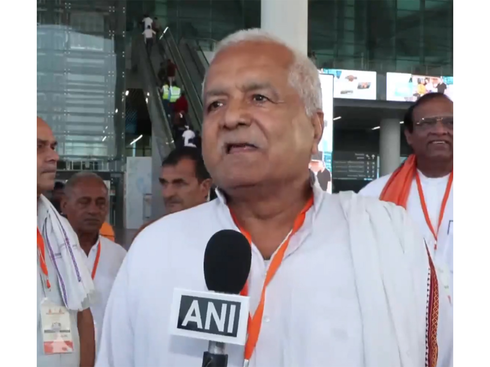 Local residents welcome the launch of commercial flight operations at Noida International Airport  (Photo/ANI)