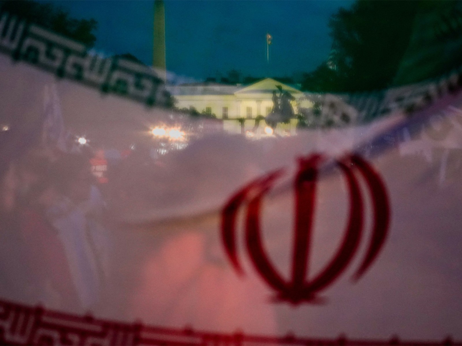White House seen through Iran's flag (File Photo/Reuters)