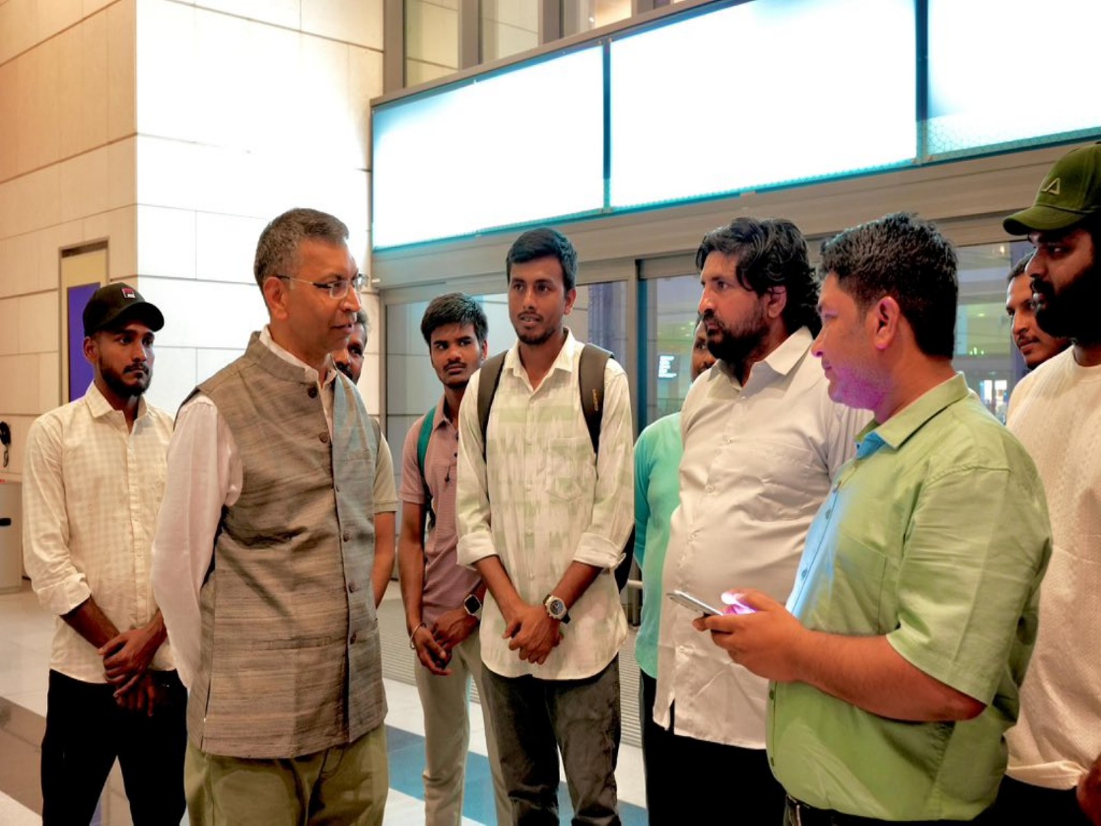 Indian Ambassador to Oman Prashant Pise interacts with the 20 Indian crew members of MT Jalveer in Muscat ahead of their repatriation to India. (Photo: X/@Indemb_Muscat)