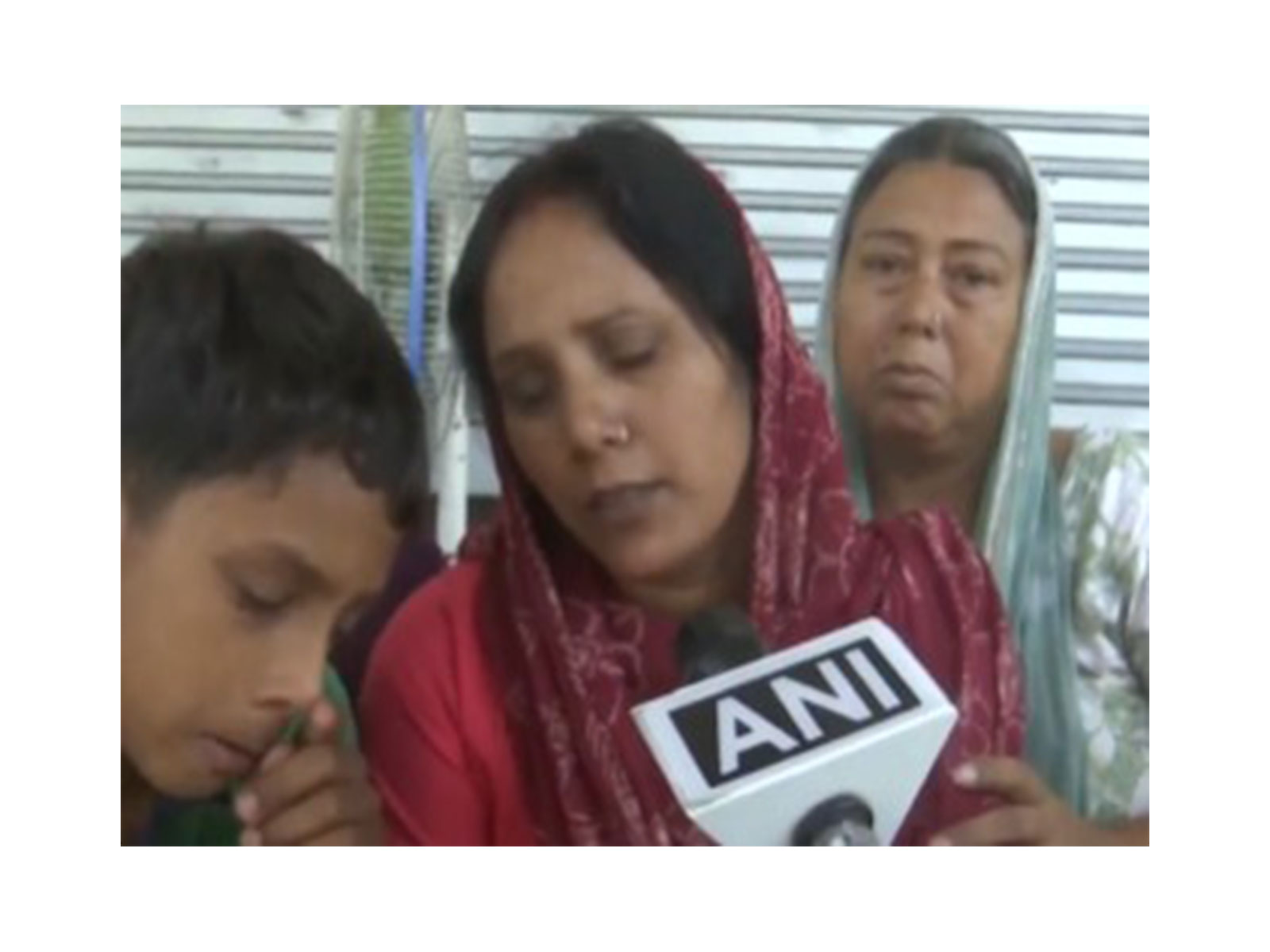 BJP worker Vinod Kumar's wife Nidhi (Photo/ANI) BJP worker Vinod Kumar's wife Nidhi (Photo/ANI)