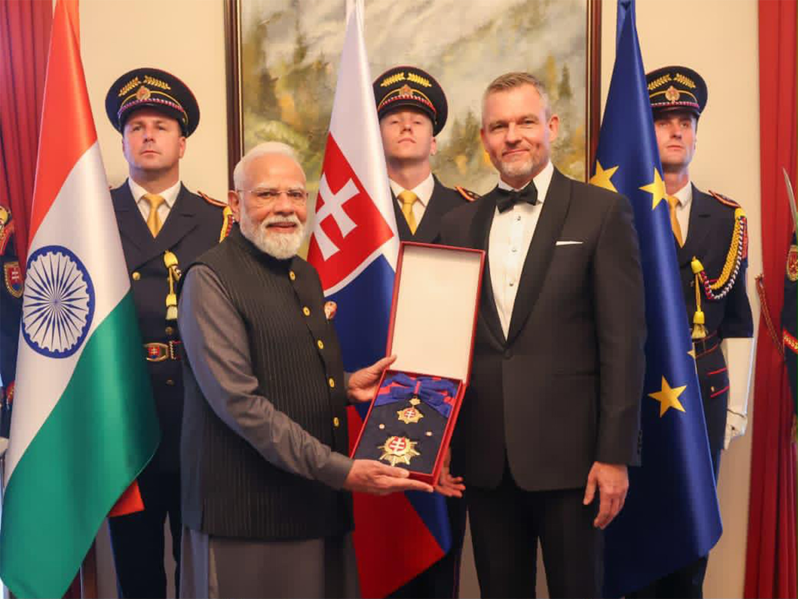 Slovak President Peter Pellegrini conferres its highest honour, the Order of the White Double Cross (1st Class) on PM Narendra Modi (Photo/ANI) Slovak President Peter Pellegrini conferres its highest honour, the Order of the White Double Cross (1st Class) on PM Narendra Modi (Photo/ANI)