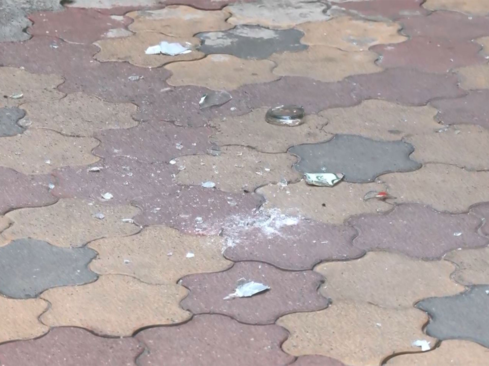 Pieces of bottles found inside the RSS office premises (Photo/ANI)