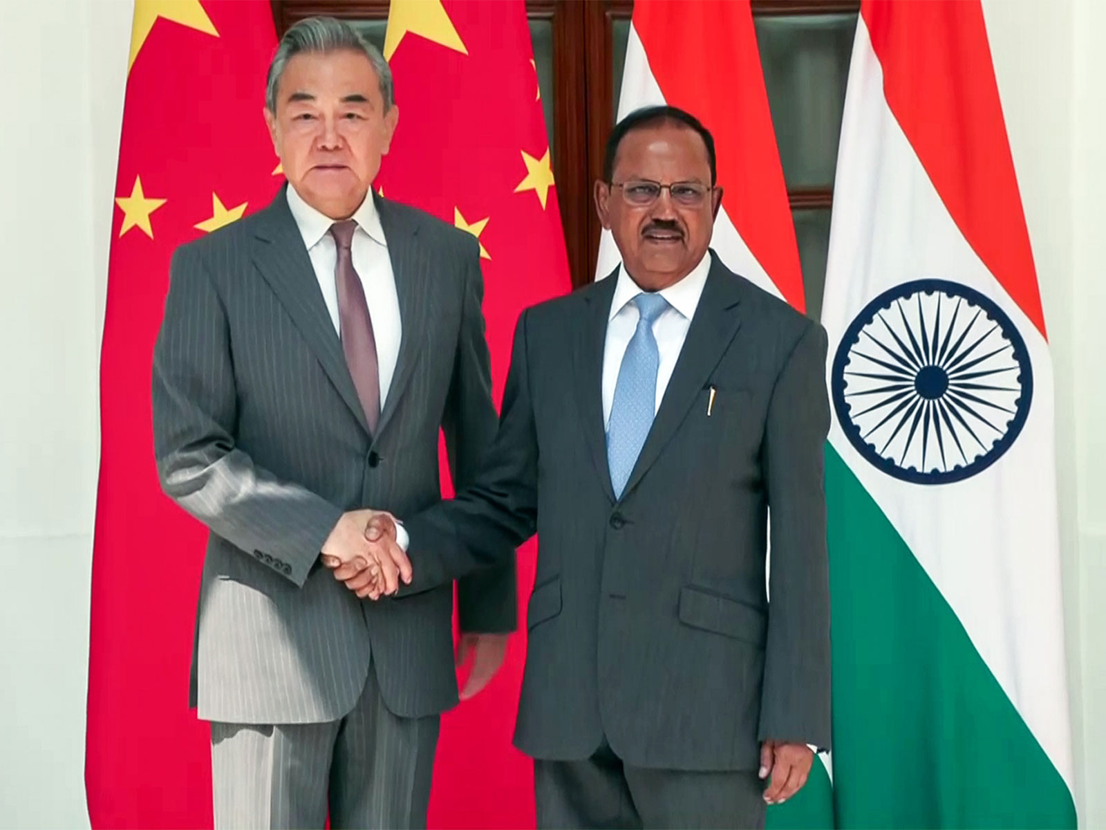 Chinese FM Wang Yi with National Security Advisor Ajit Doval in 2025 (File Photo/ANI)