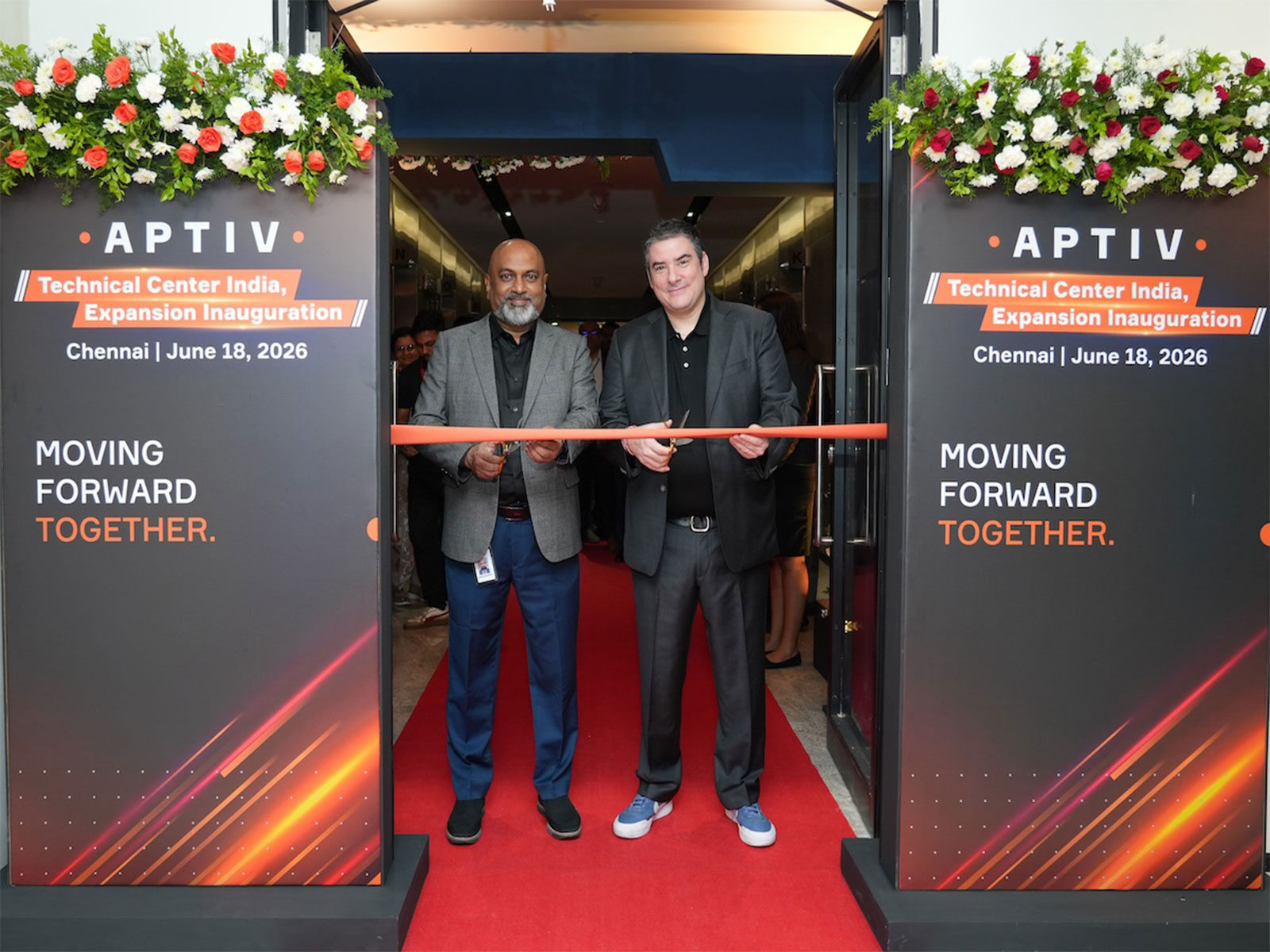 Arun Devaraj and Laurent Balzano of Aptiv leadership at the ribbon-cutting ceremony during the inauguration.