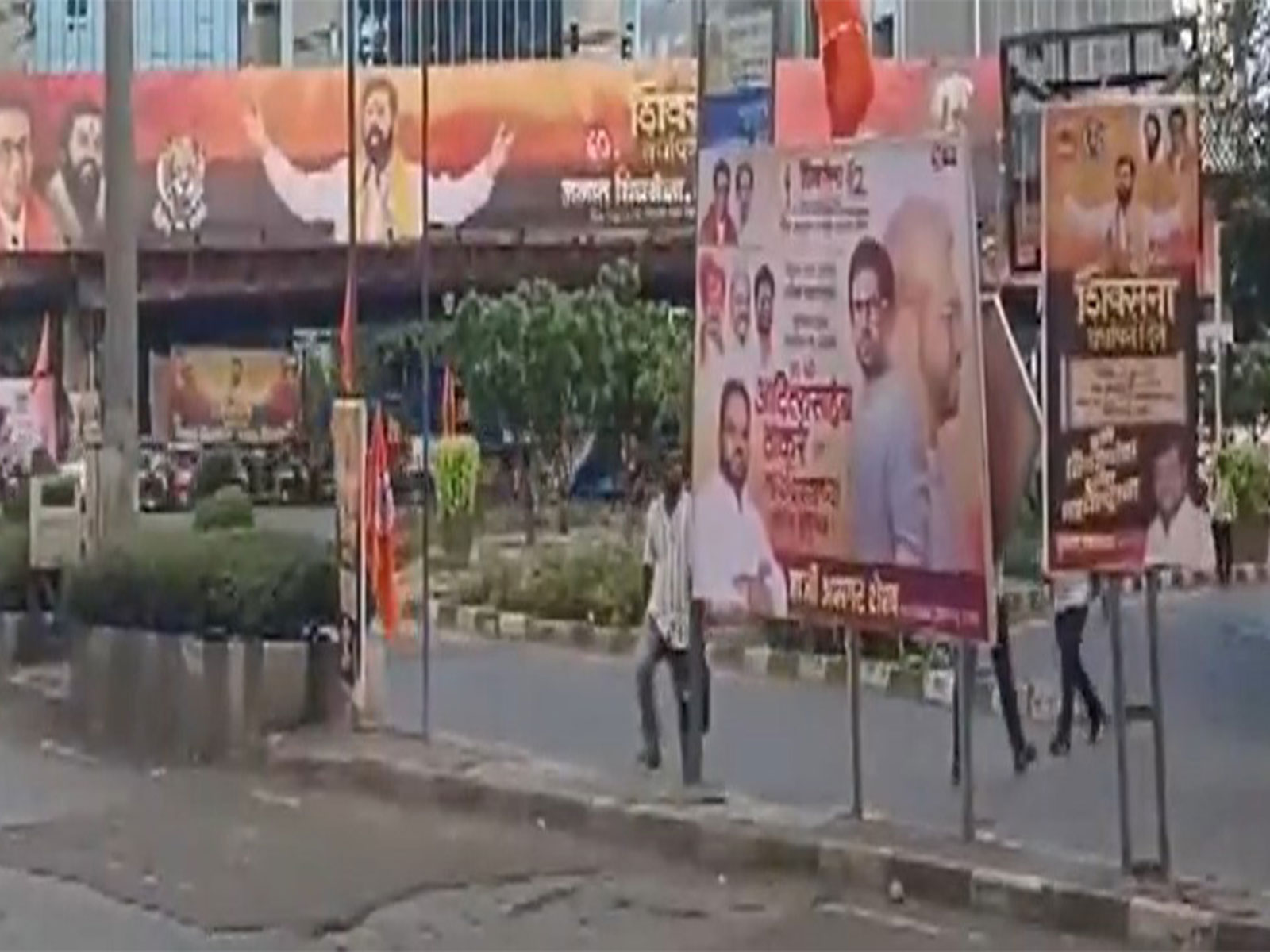Posters of both Shiv Sena factions adorn Mumbai as the party marks its foundation day amid political speculation over 