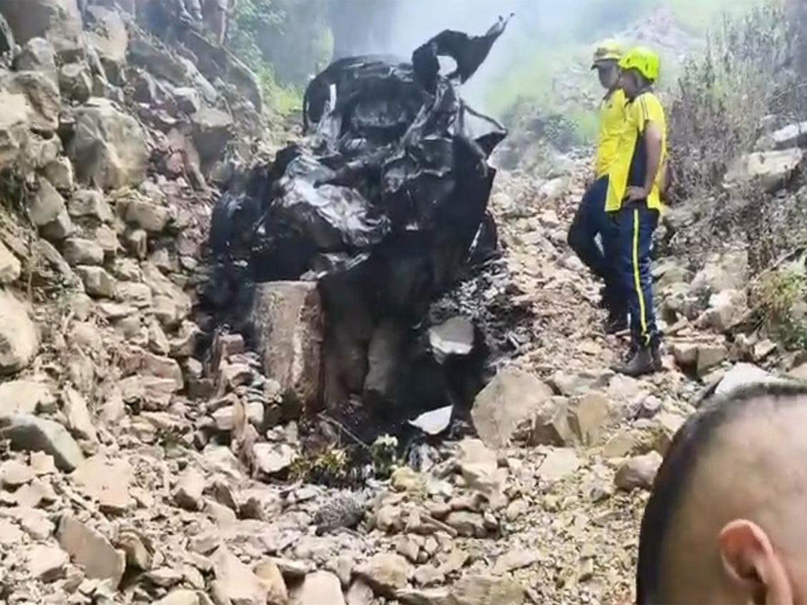 Charred remains of the vehicle inside a gorge in Uttarakahand (Photo/ Uttarakhand SDRF)