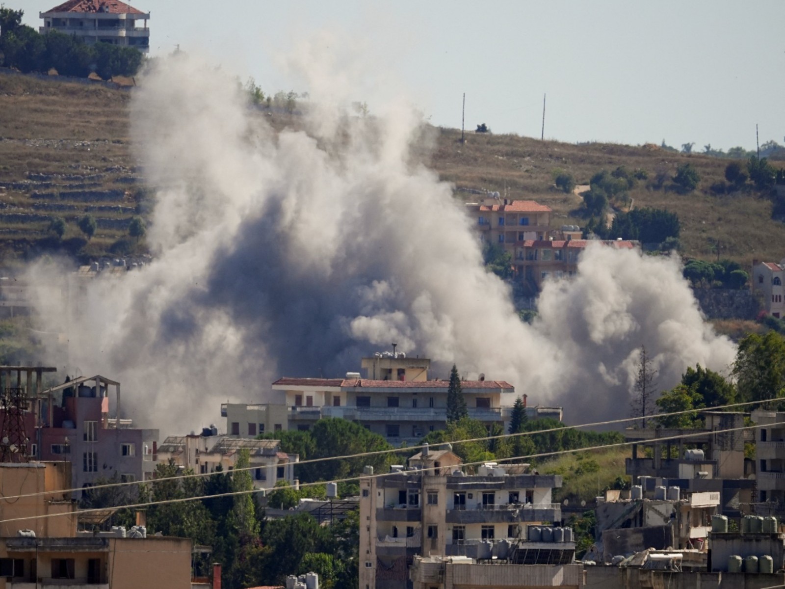Smoke billows from southern Lebanon following an Israeli strike, as seen from Nabatieh (Photo/Reuters)