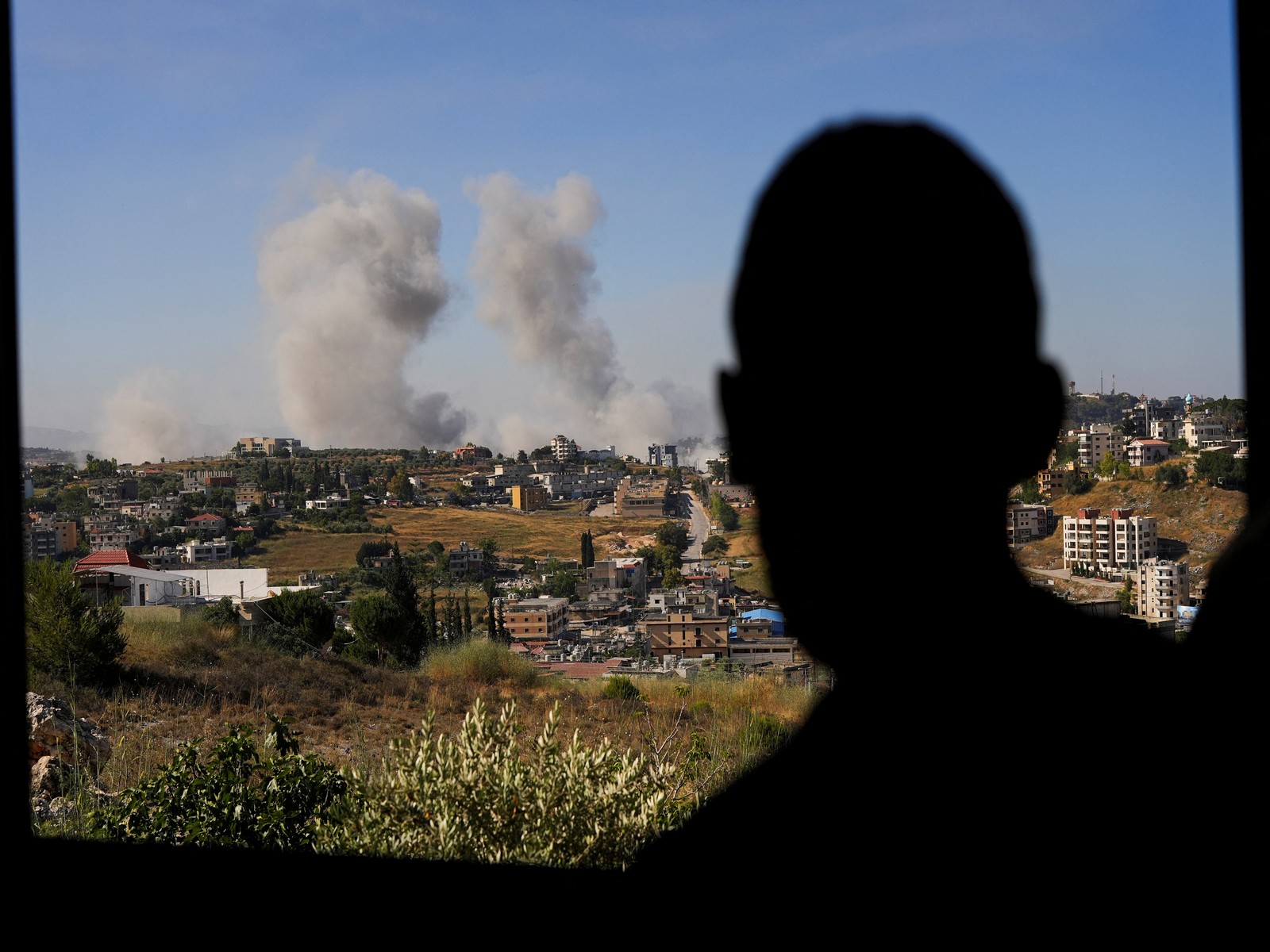 Smoke billows from southern Lebanon following an Israeli strike, as seen from Nabatieh (Photo/Reuters)
