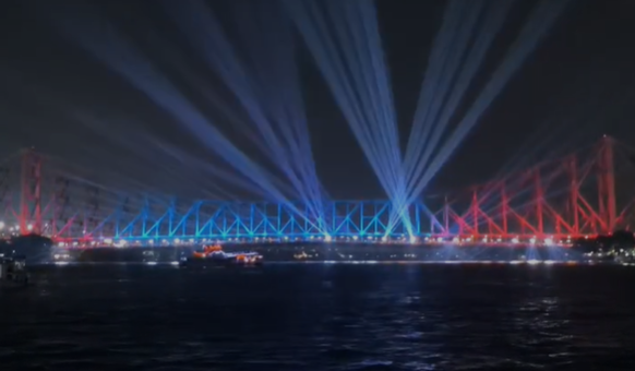 Howrah Bridge lights up ahead of International Yoga Day celebrations in Kolkata