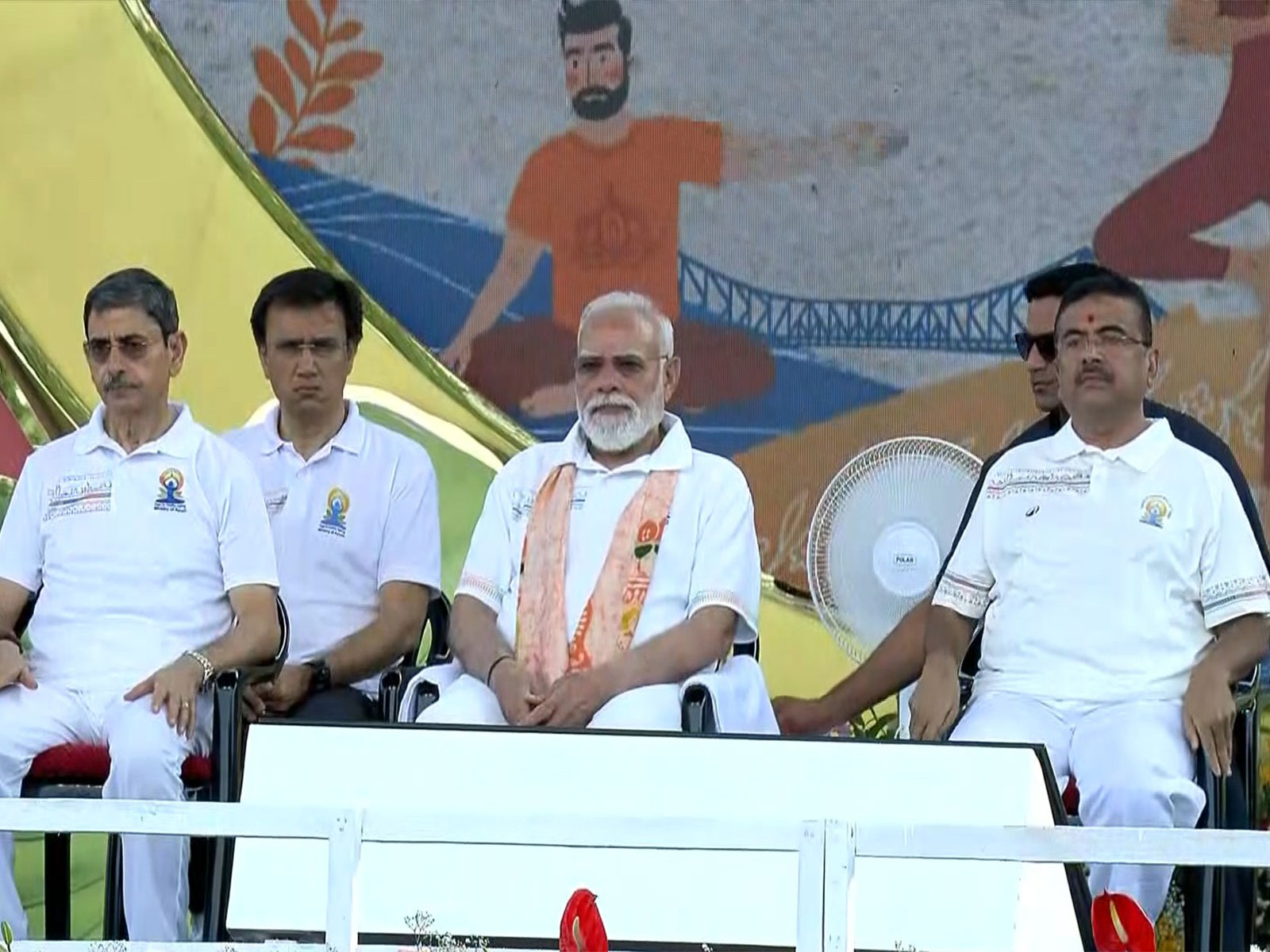 PM Modi leads national observance for 12th International Day of Yoga in Kolkata (Photo/DD) PM Modi leads national observance for 12th International Day of Yoga in Kolkata (Photo/DD)