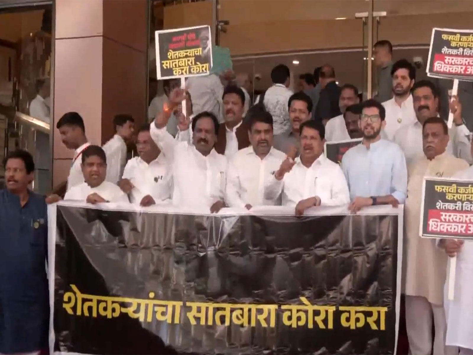 Opposition MLAs protest over farmers' loan waiver issue on first day of Monsoon session (Photo/ANI) Opposition MLAs protest over farmers' loan waiver issue on first day of Monsoon session (Photo/ANI)