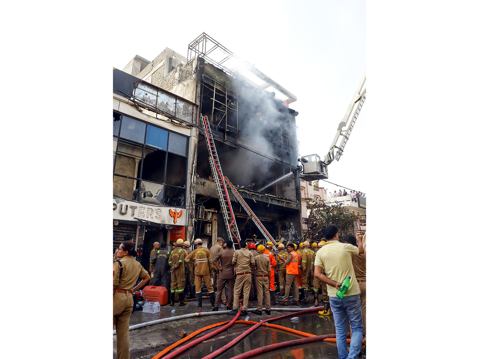 A fire broke out at a commercial building in Aliganj area of Lucknow (Photo/ANI) A fire broke out at a commercial building in Aliganj area of Lucknow (Photo/ANI)