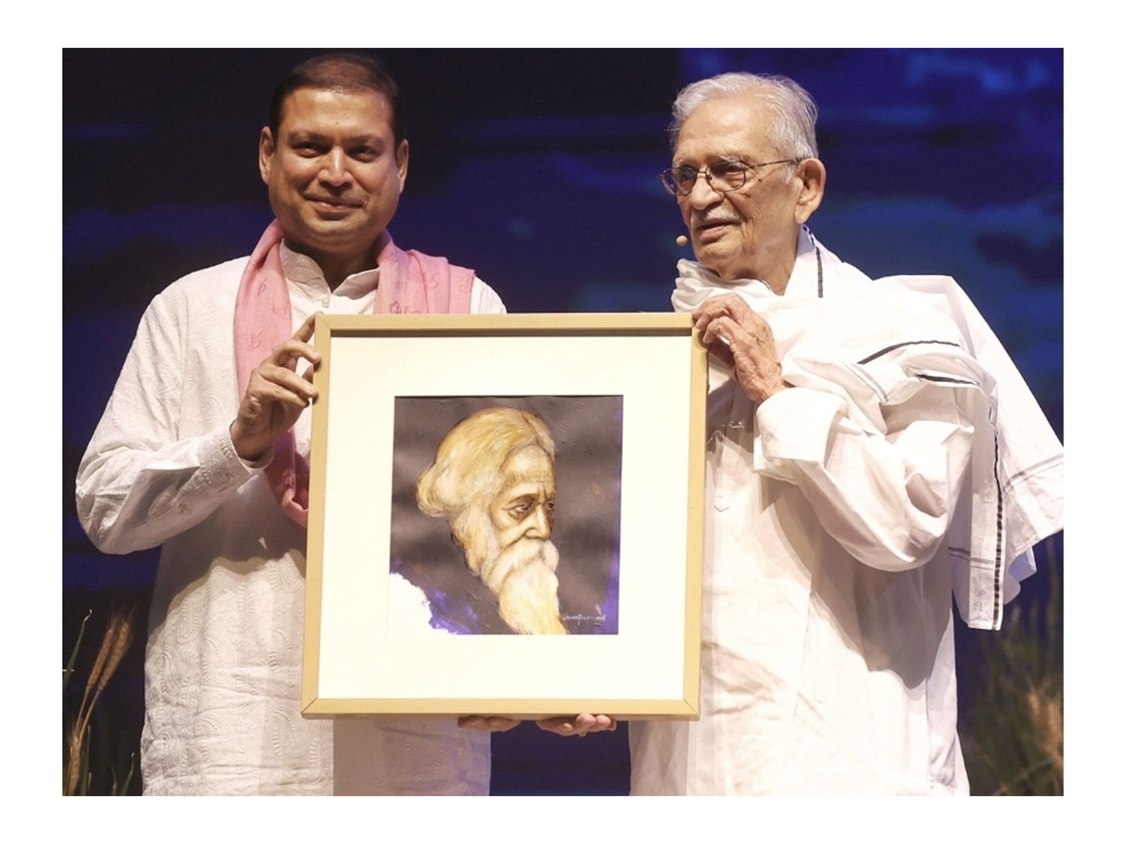 Mr. Sundeep Bhutoria, culturist, presenting a Suvaprasanna-painting of Kavi Guru Rabindranath Tagore to Gulzar during World Music Day 2026 in Kolkata