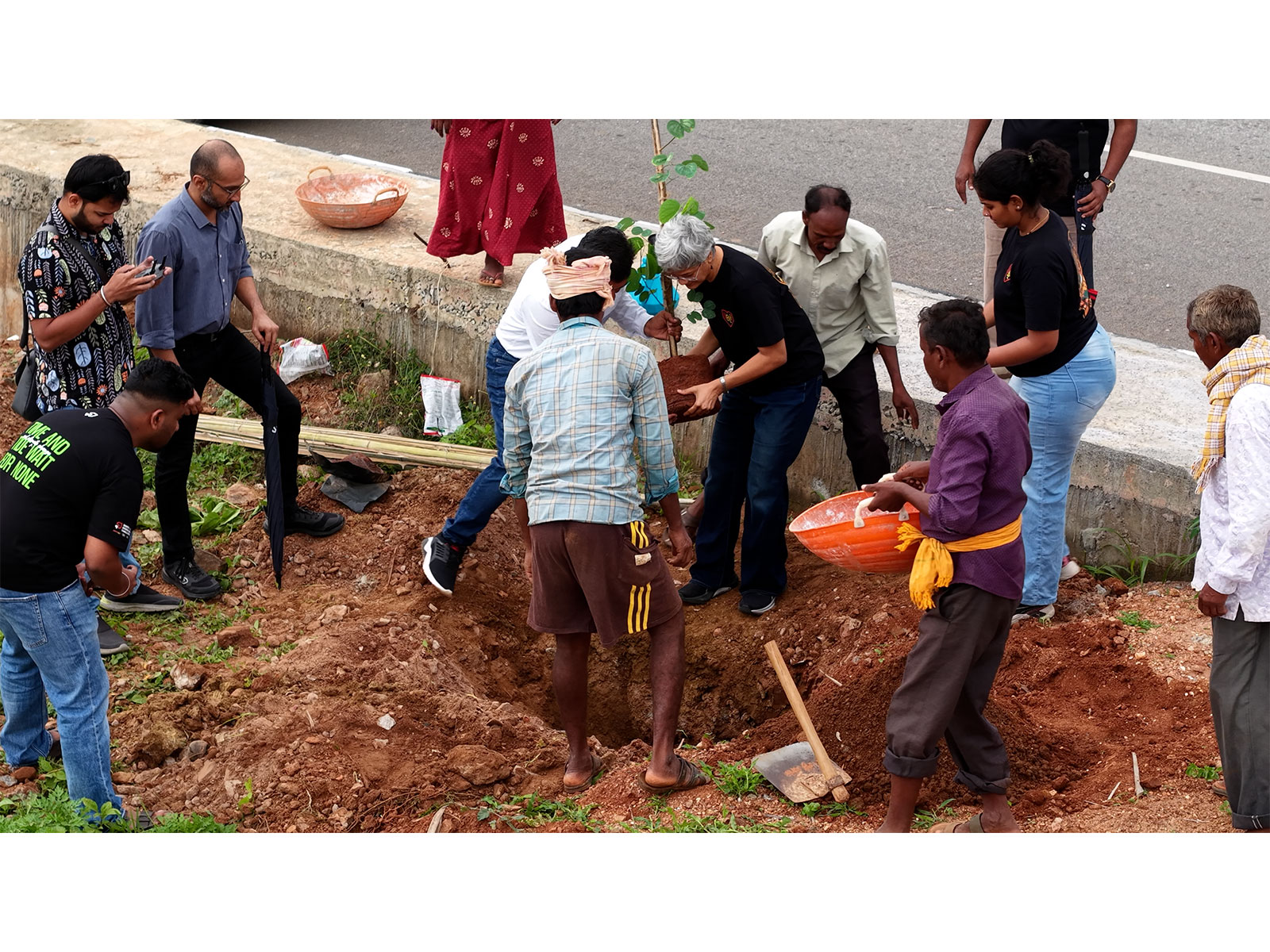 UBLR planting the first sapling for Bloom Avenue on Major Arterial Road