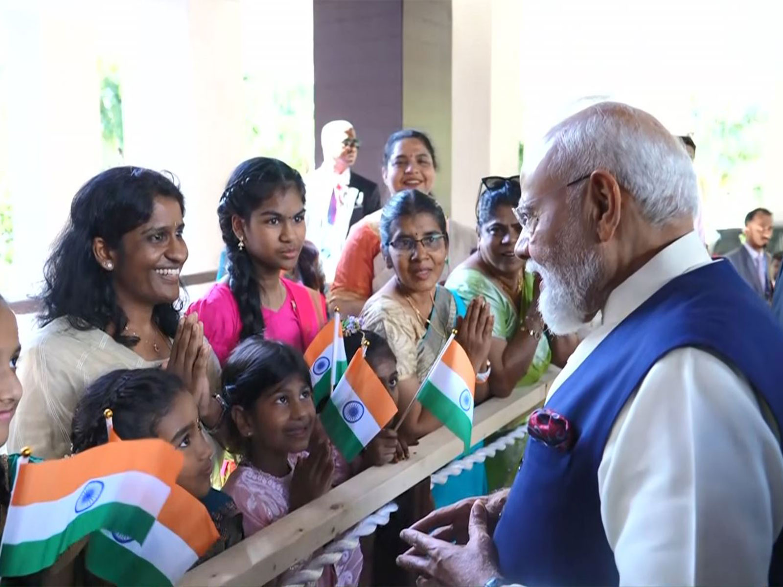 Prime Minister Narendra Modi receives warm welcome from Indian diaspora upon his arrival at a hotel in Victoria during his three-day State Visit to Seychelles. (Image Source: ANI/DD) Prime Minister Narendra Modi receives warm welcome from Indian diaspora upon his arrival at a hotel in Victoria during his three-day State Visit to Seychelles. (Image Source: ANI/DD)