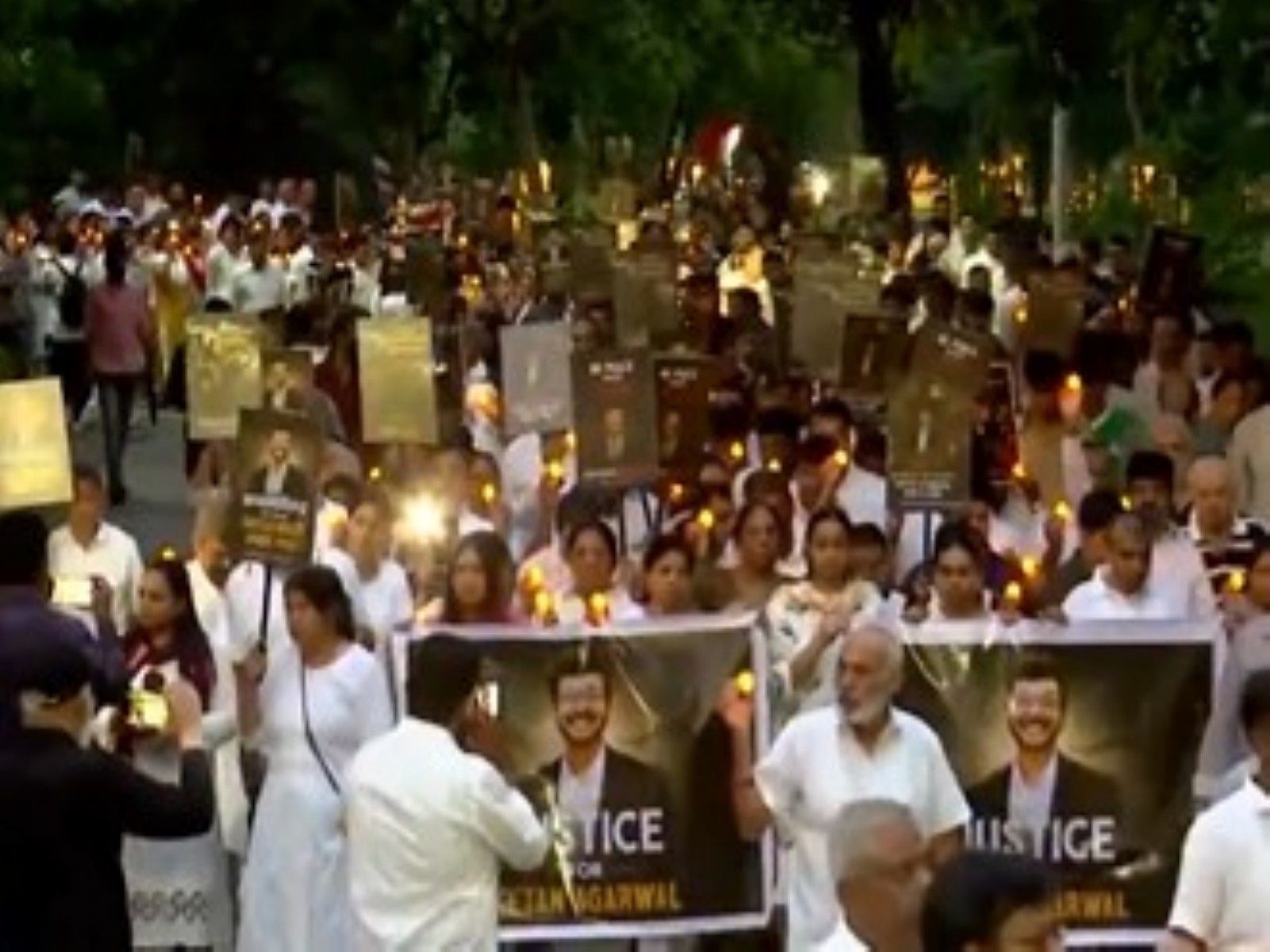 Ketan Agarwal's family, residents hold a candlelight march (Photo/ANI) Ketan Agarwal's family, residents hold a candlelight march (Photo/ANI)