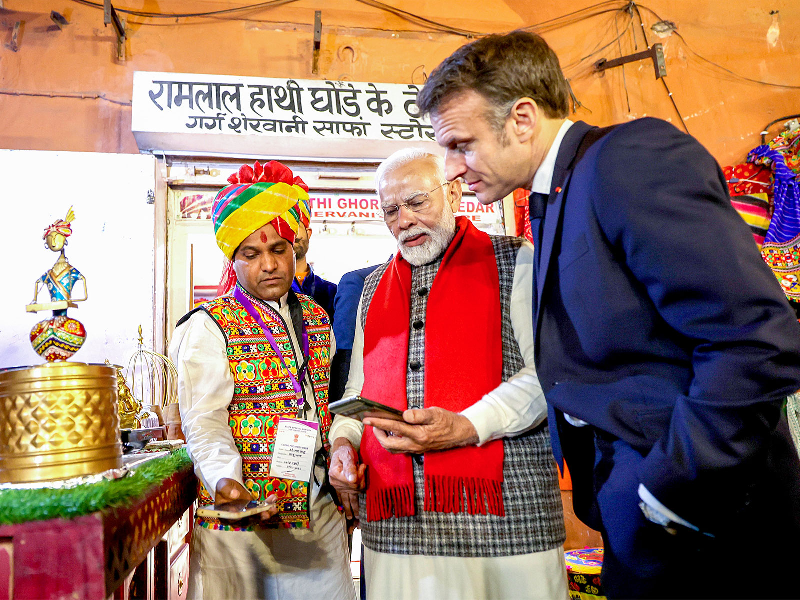 Prime Minister Narendra Modi explaining the UPI digital payments system to French President Emanuel Macron (Photo/ANI)