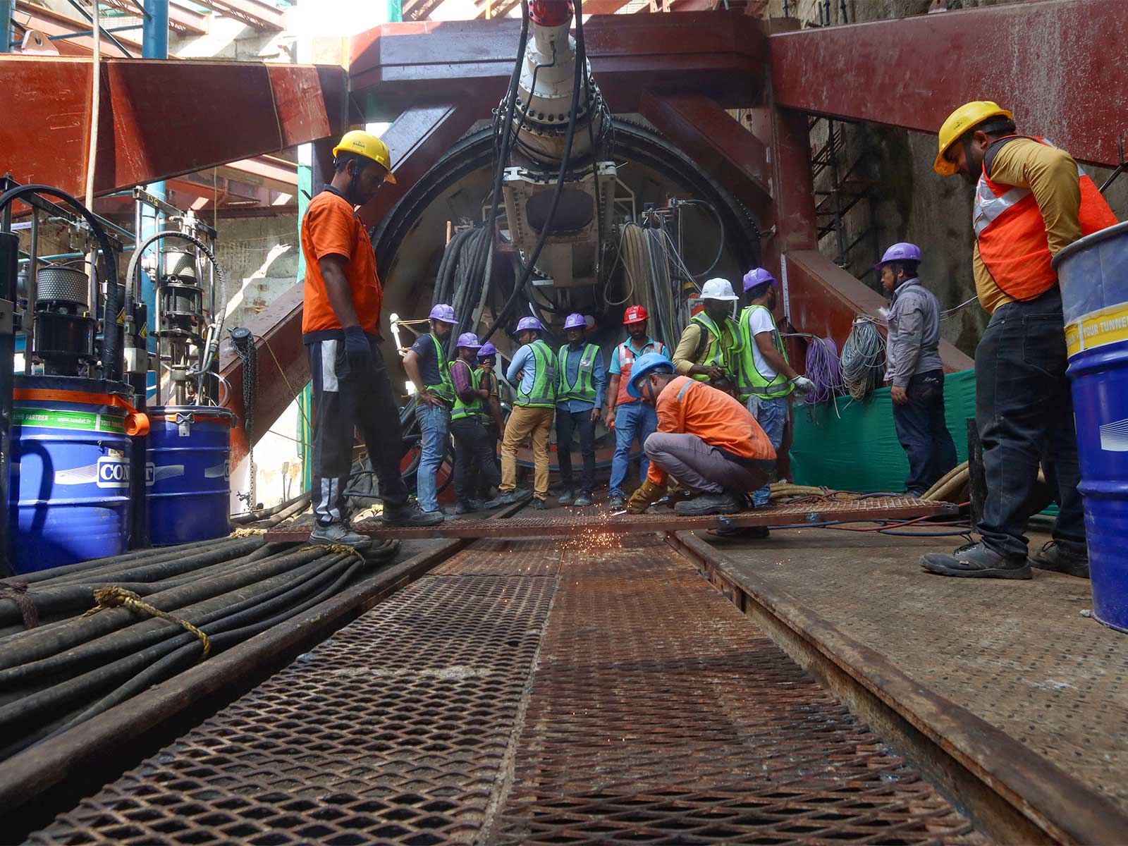 Labourers working at a manufacturing site (Photo-ANI)