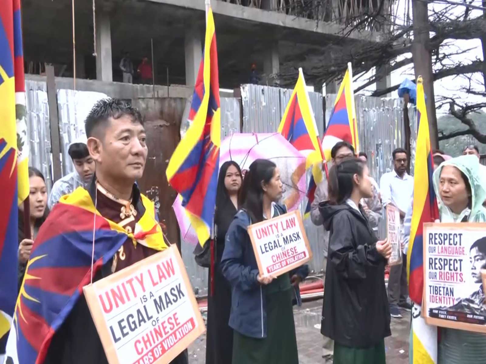 Tibetan activists stage a protest during a Global Day of Action against China's 
