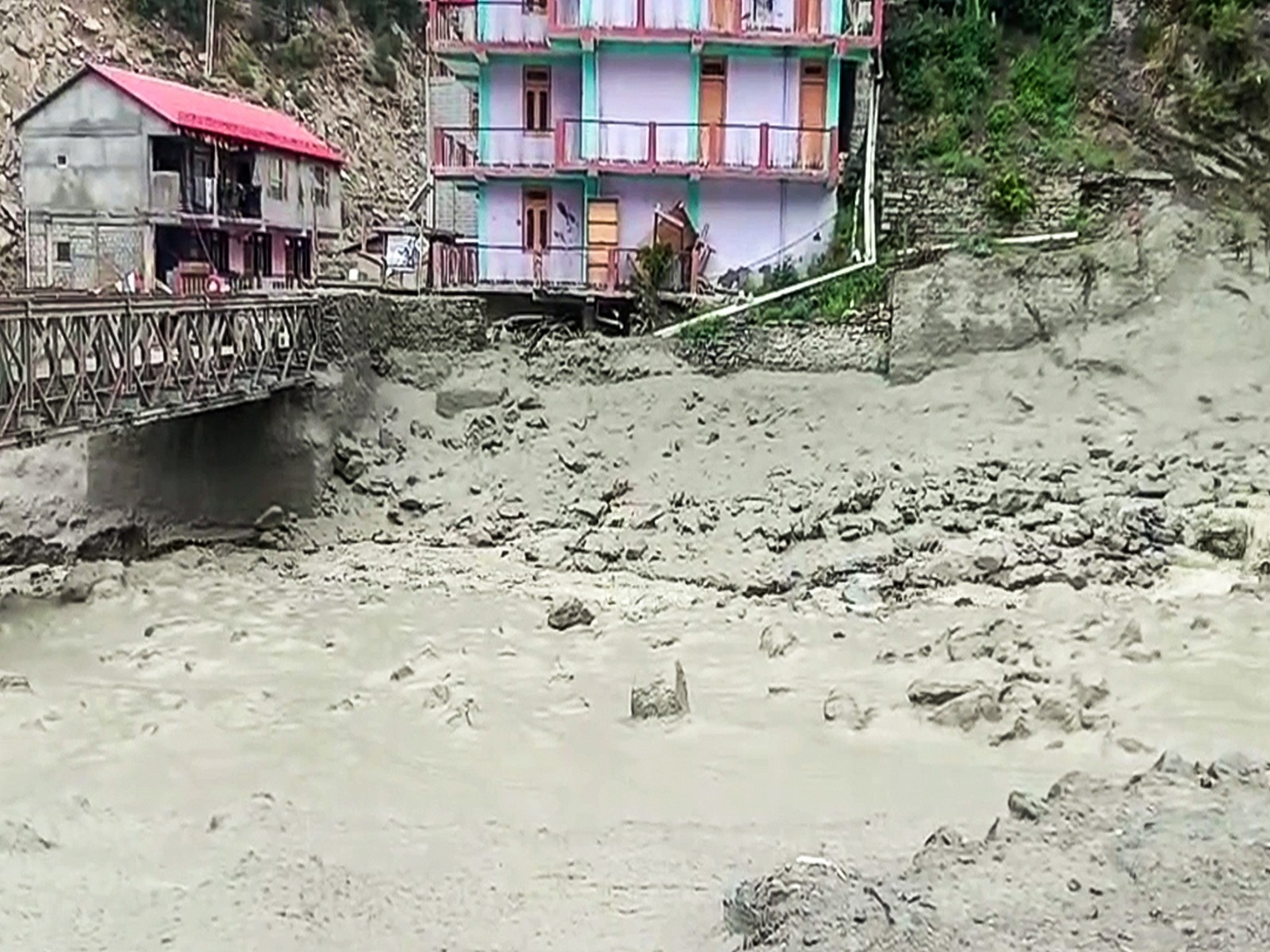 A view of scattered debris at irrigation bridge in Rip Tejer area (Photo/ANI) A view of scattered debris at irrigation bridge in Rip Tejer area (Photo/ANI)