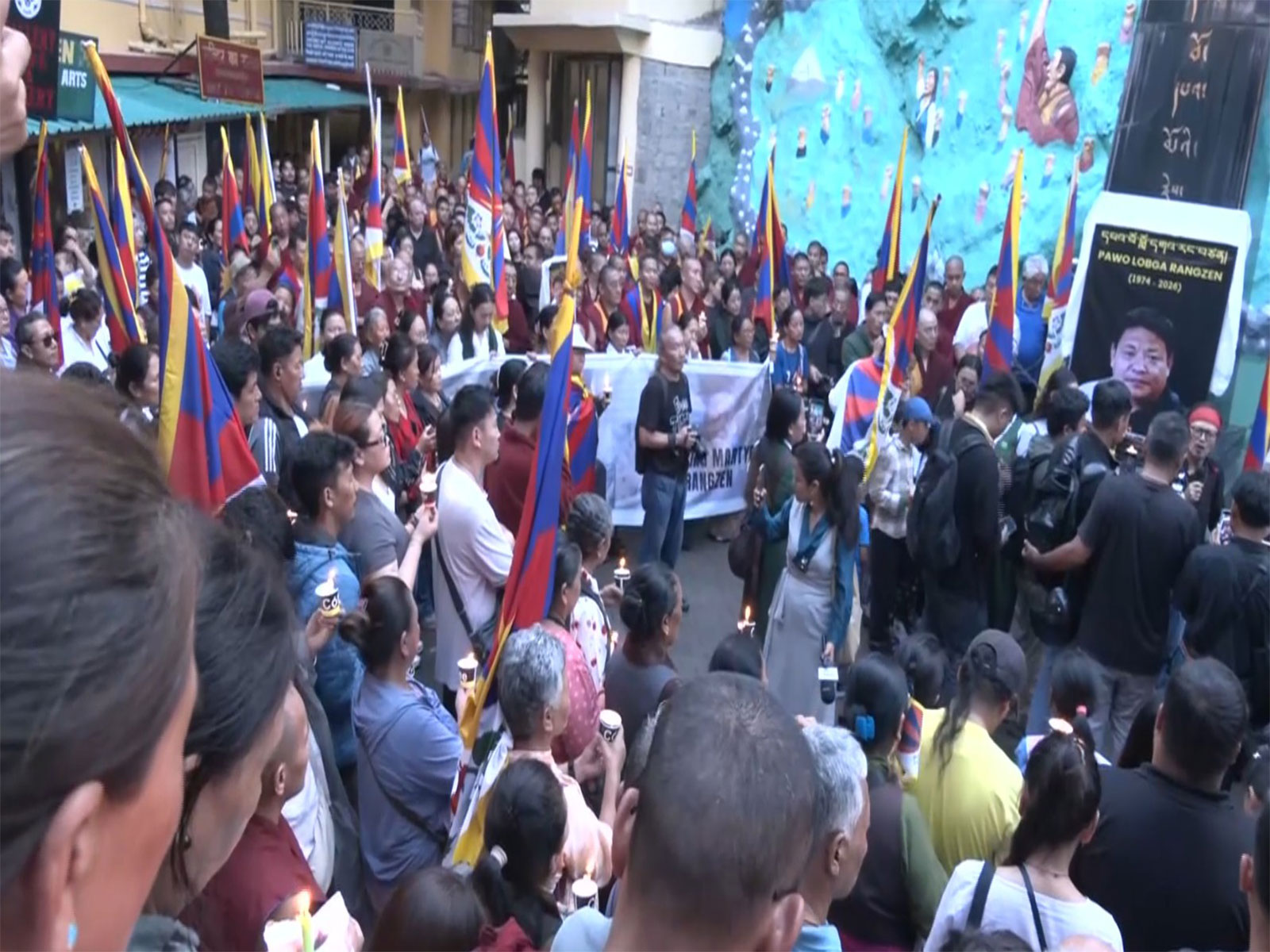 Candlelight vigils held in Dharamshala to mourn Tibetan activist death (Photo/ANI) Candlelight vigils held in Dharamshala to mourn Tibetan activist death (Photo/ANI)
