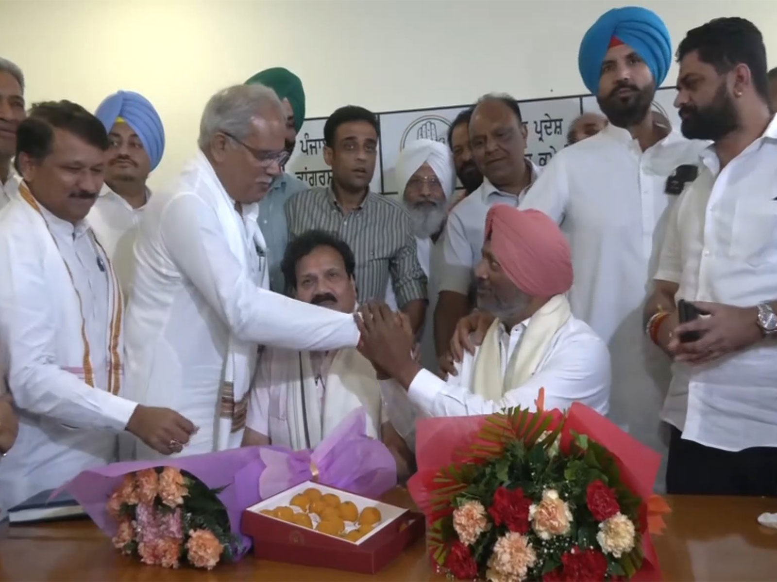 AICC General Secretary in-charge of Punjab Bhupesh Baghel (Second from left) (Photo/ANI) AICC General Secretary in-charge of Punjab Bhupesh Baghel (Second from left) (Photo/ANI)