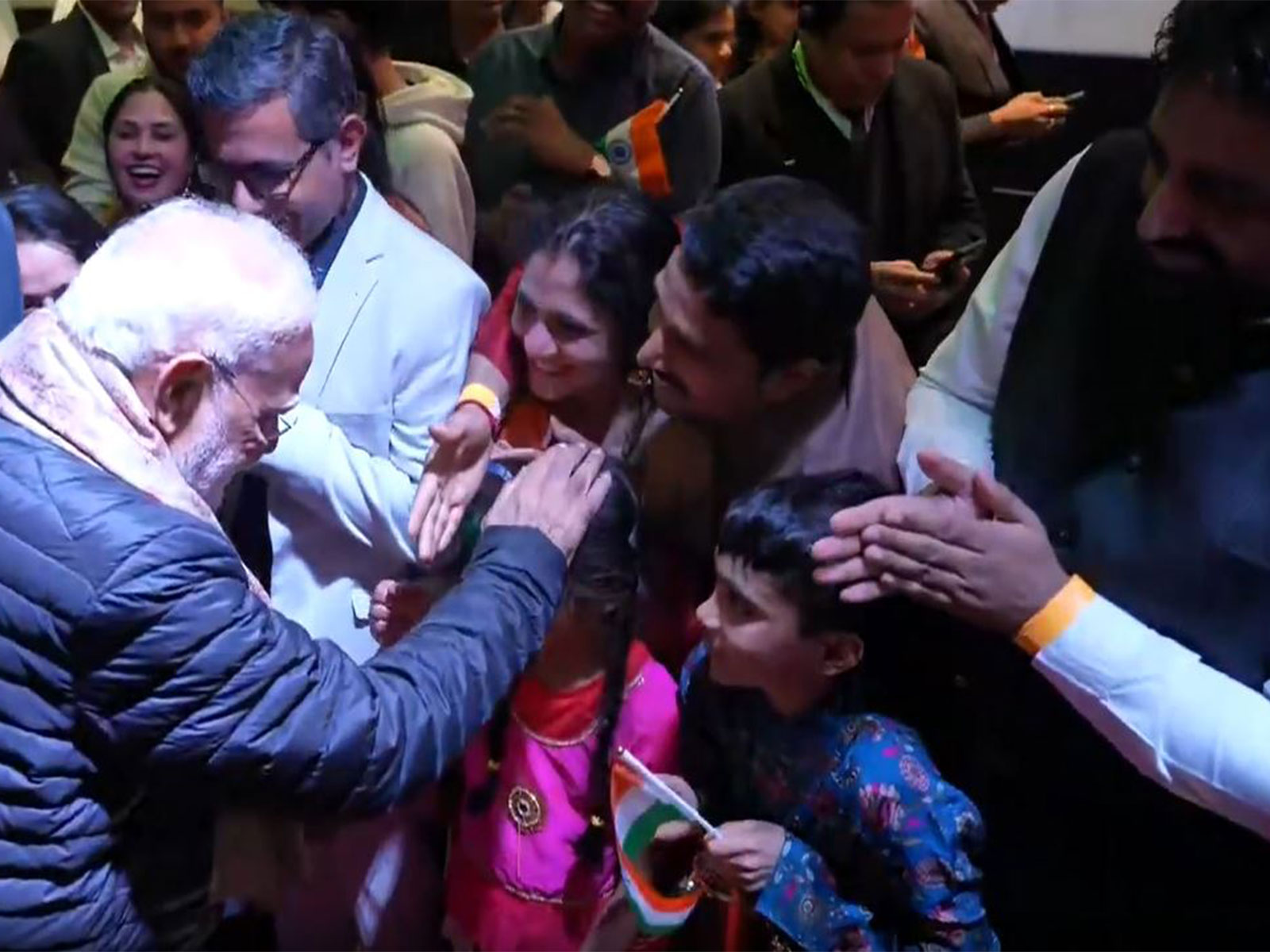 PM Modi with Indian community members (Photo/ANI) PM Modi with Indian community members (Photo/ANI)