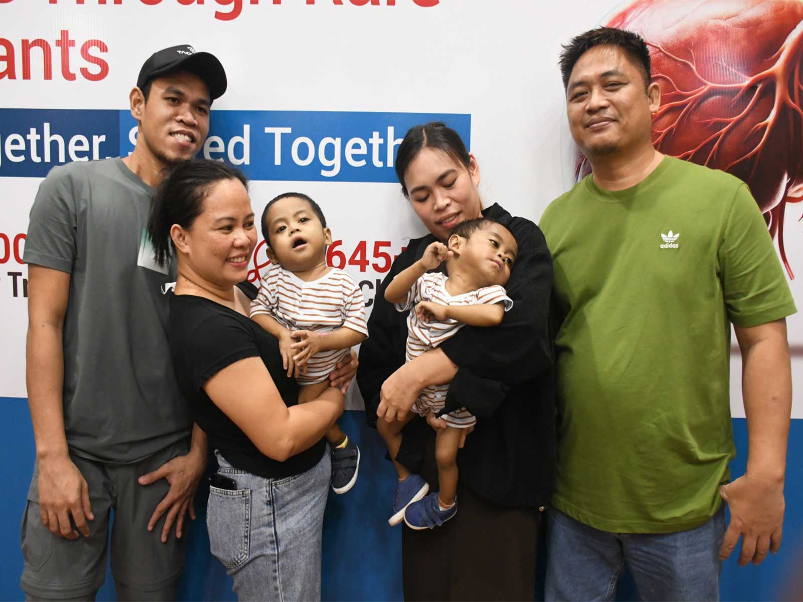 Family members of 23-month-old twins from the Philippines. (Photo/ANI) Family members of 23-month-old twins from the Philippines. (Photo/ANI)