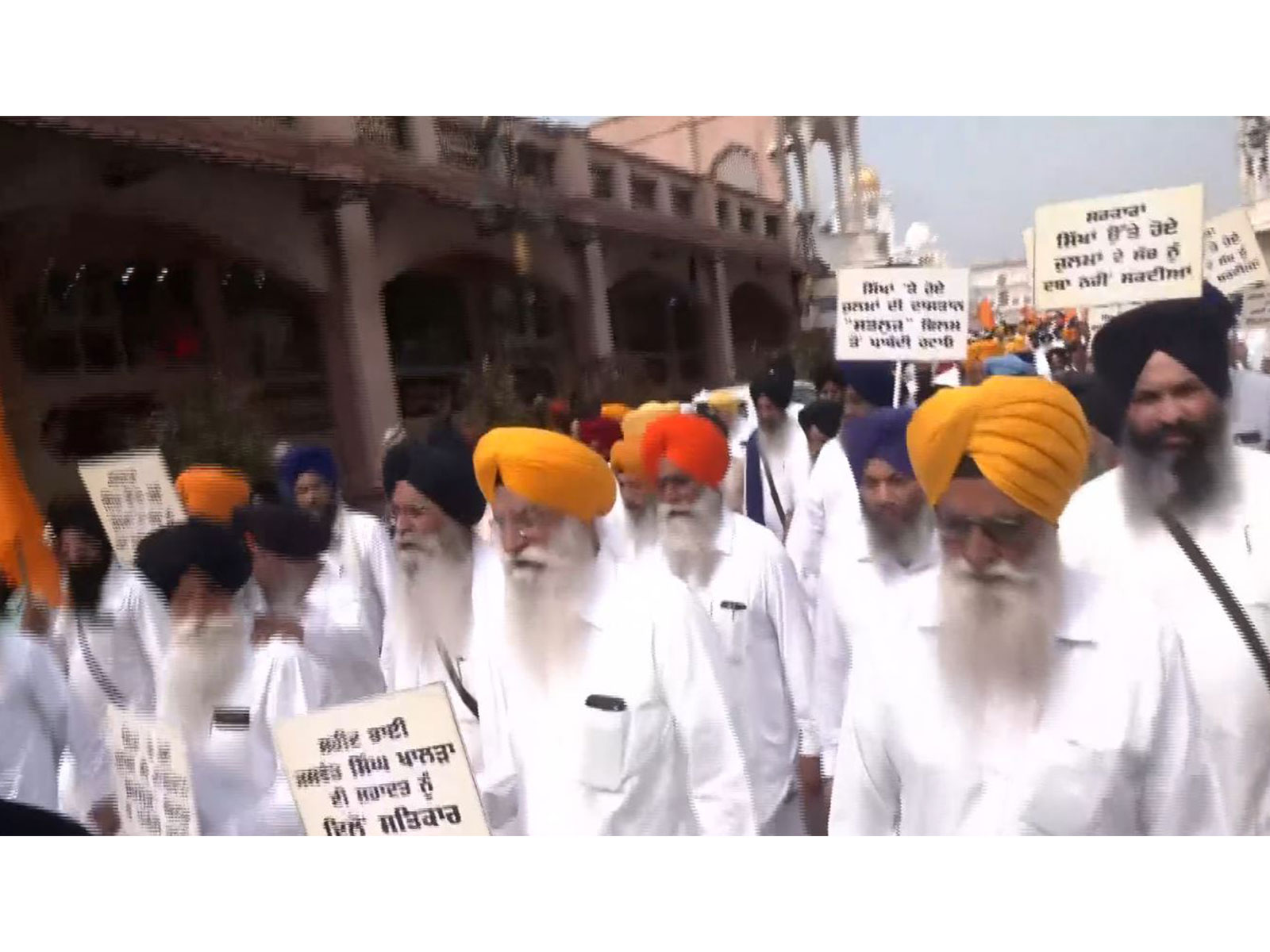 SGPC holds protest march in Amritsar, seeks lifting of ban on film 'Satluj' (Photo/ANI) SGPC holds protest march in Amritsar, seeks lifting of ban on film 'Satluj' (Photo/ANI)