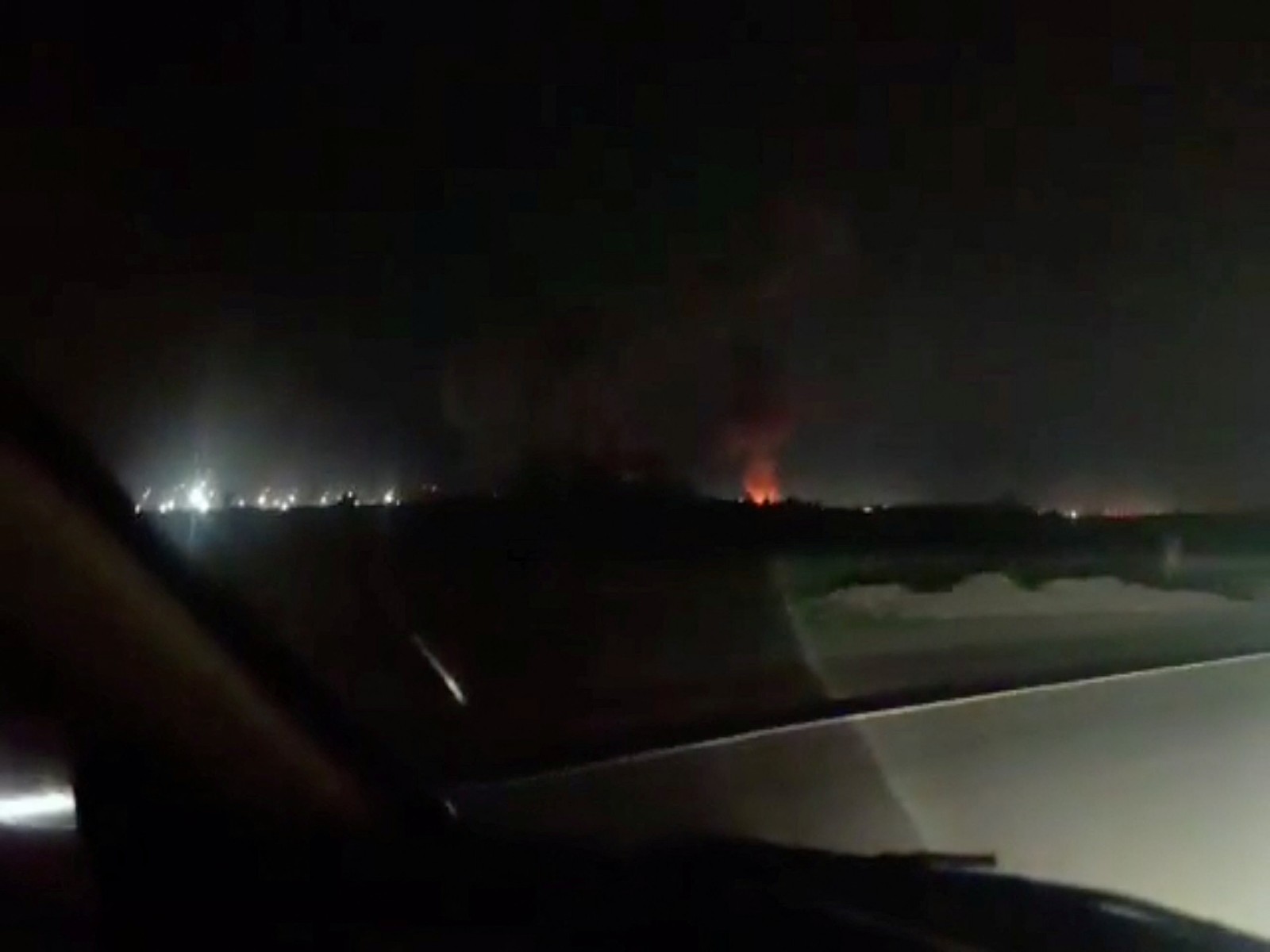 Fire and smoke rise from the direction of Iranshahr airport (Photo/Reuters) Fire and smoke rise from the direction of Iranshahr airport (Photo/Reuters)