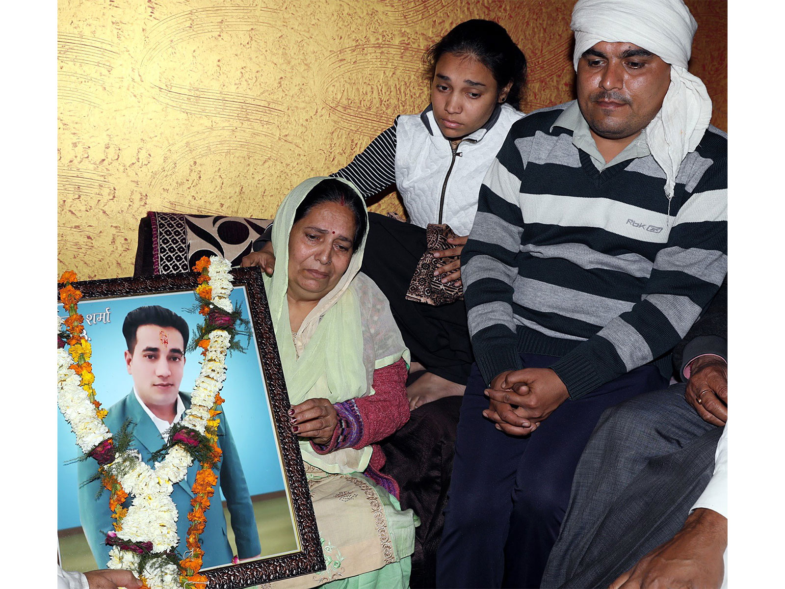 Ankit Sharma, an Intelligence Bureau officer's family (File Photo/ANI) Ankit Sharma, an Intelligence Bureau officer's family (File Photo/ANI)