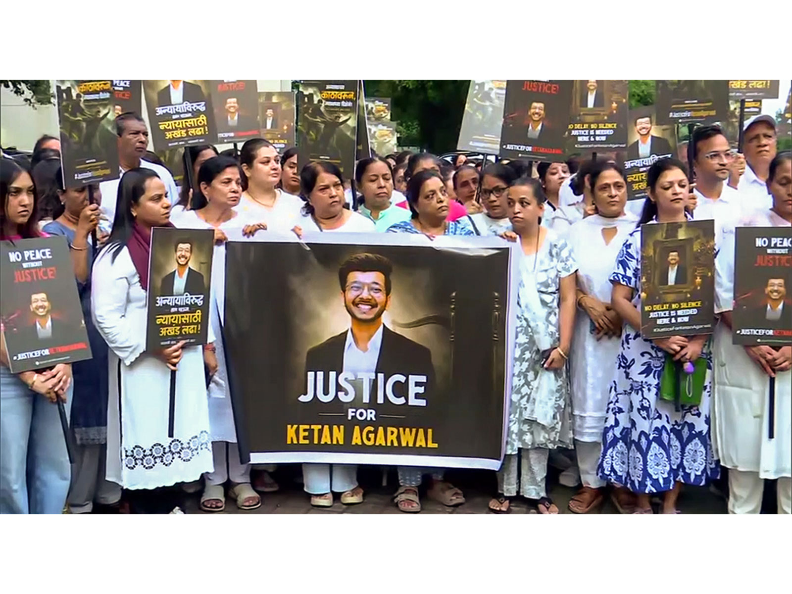 Ketan Agarwal's family members and society residents hold a candlelight march (File Photo/ANI)