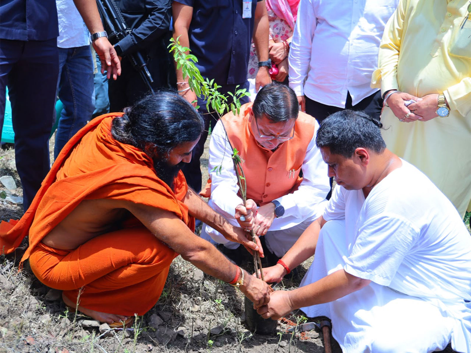 Uttarakhand Chief Minister Pushkar Singh Dhami with Yog Guru Baba Ramdev (Photo/ANI) Uttarakhand Chief Minister Pushkar Singh Dhami with Yog Guru Baba Ramdev (Photo/ANI)
