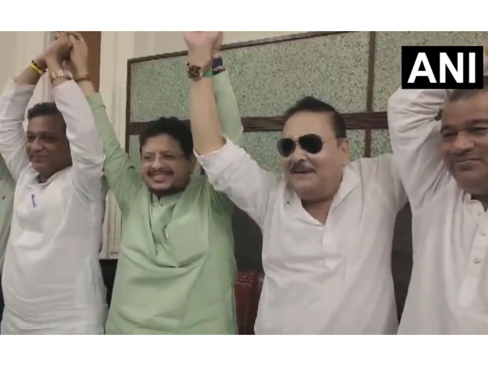 Madan Mitra with sunglasses (2nd from right) (Photo/ANI)