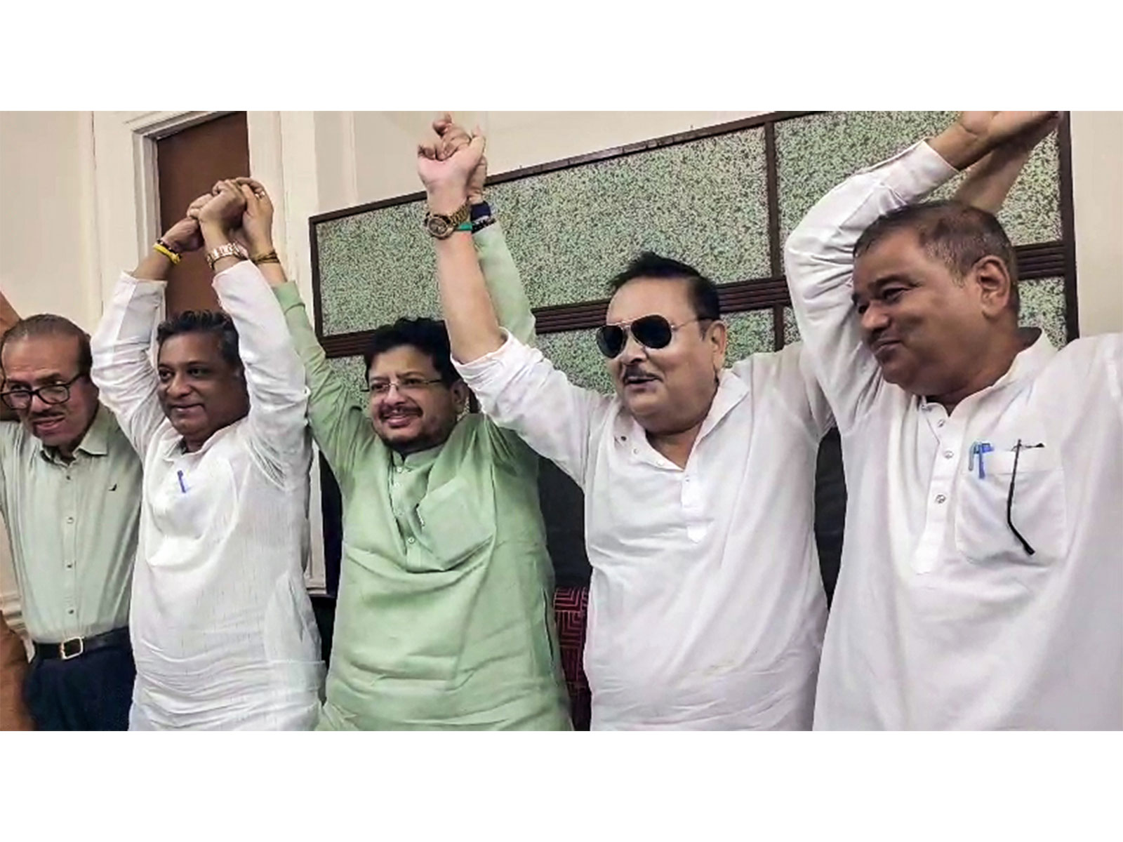 West Bengal MLA Madan Mitra (in sunglasses) with LoP Ritabrata Banerjee and TMC rebel faction leaders (Photo/ANI)