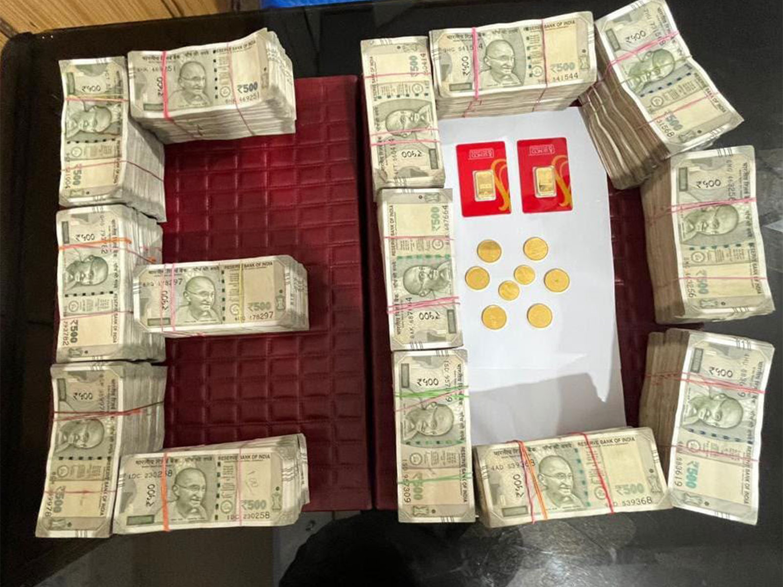 Cash and gold coins seized in West Bengal (Photo/ED) Cash and gold coins seized in West Bengal (Photo/ED)