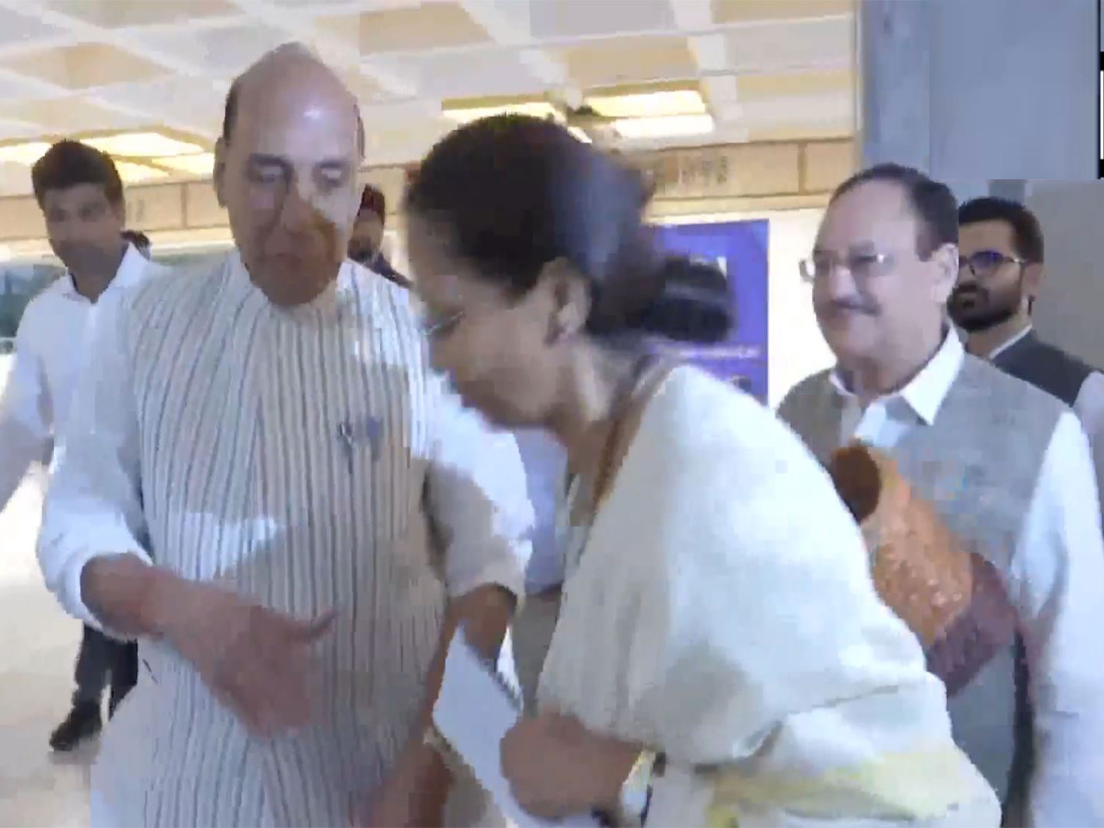 Supriya Sule makes respectful gesture towards Rajnath Singh (Photo/ANI)