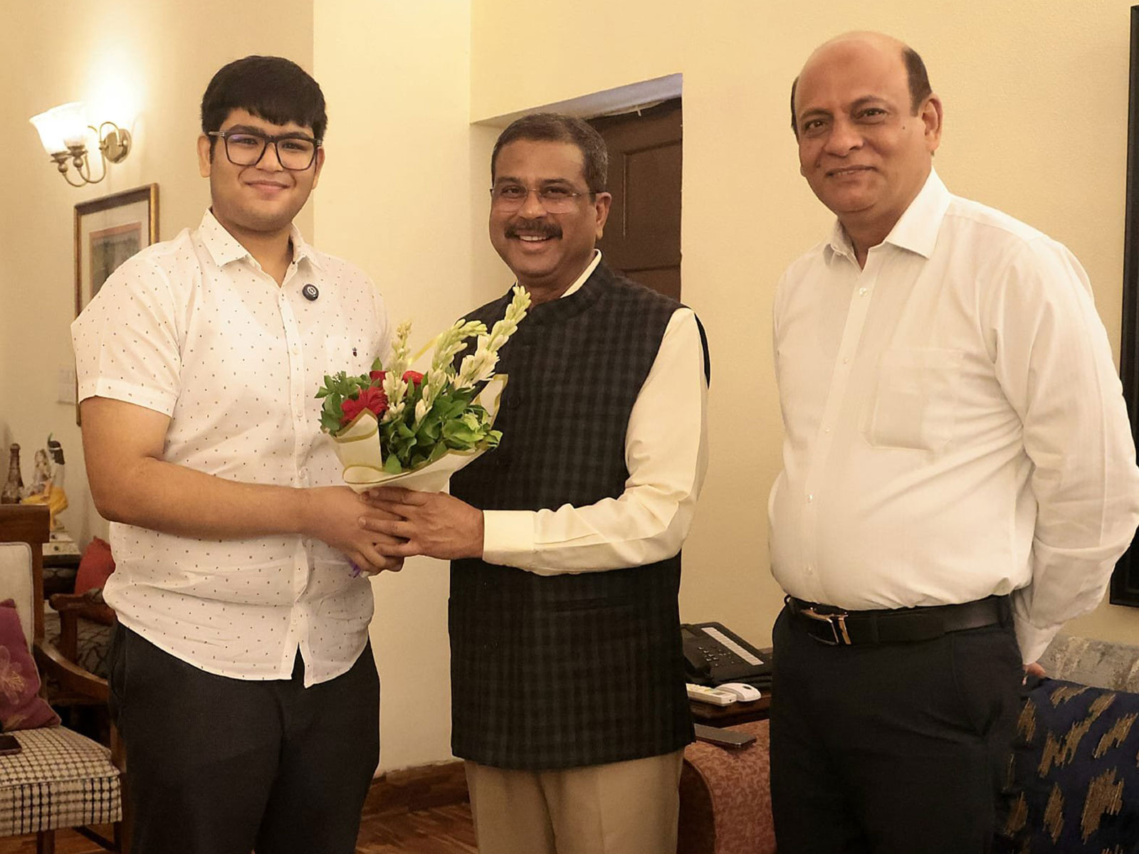 Education Minister Dharmendra Pradhan with Panshul Bansal (Photo X/ Dharmendra Pradhan)