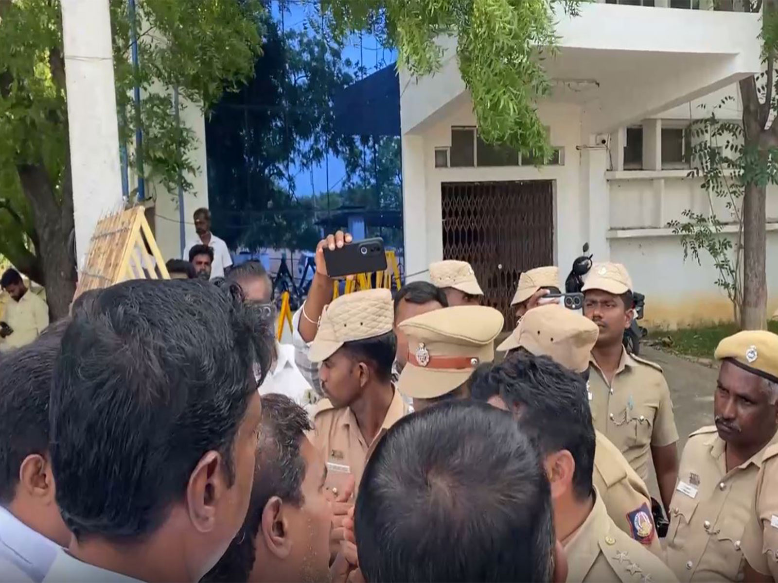 Supporters of DMK MLA Markandeyan outside the Police Station (Photo/ANI)
