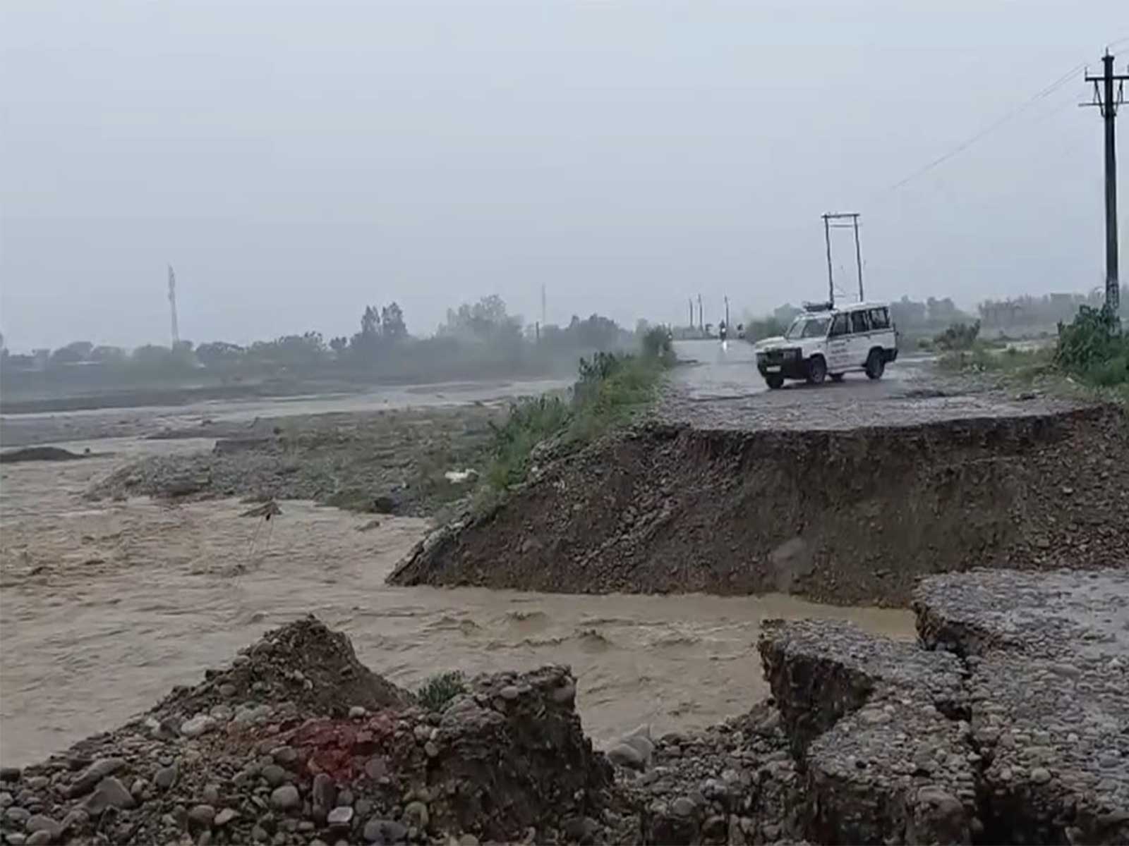 Heavy rainfall damages old Samba-Kathua road in Jammu and Kashmir. (Photo/ANI)
