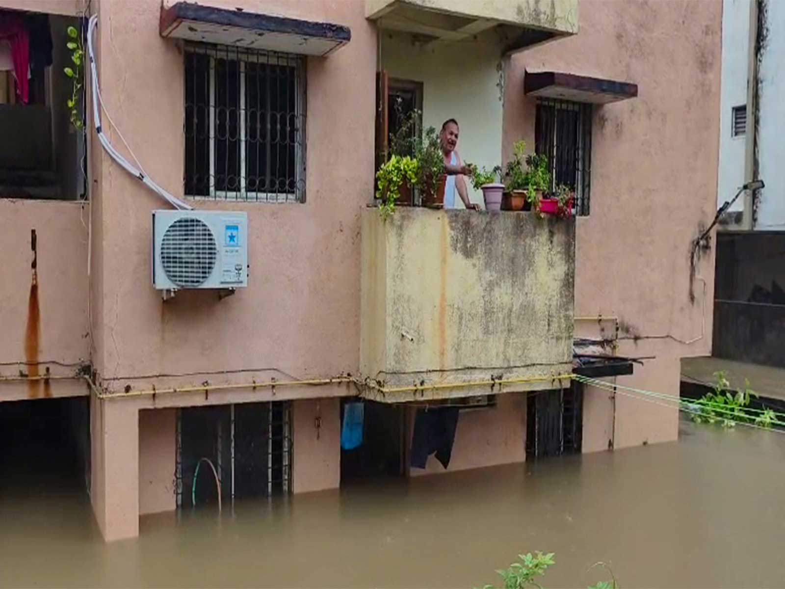 Flooding after heavy rainfall in Valsad (Photo/ANI) Flooding after heavy rainfall in Valsad (Photo/ANI)