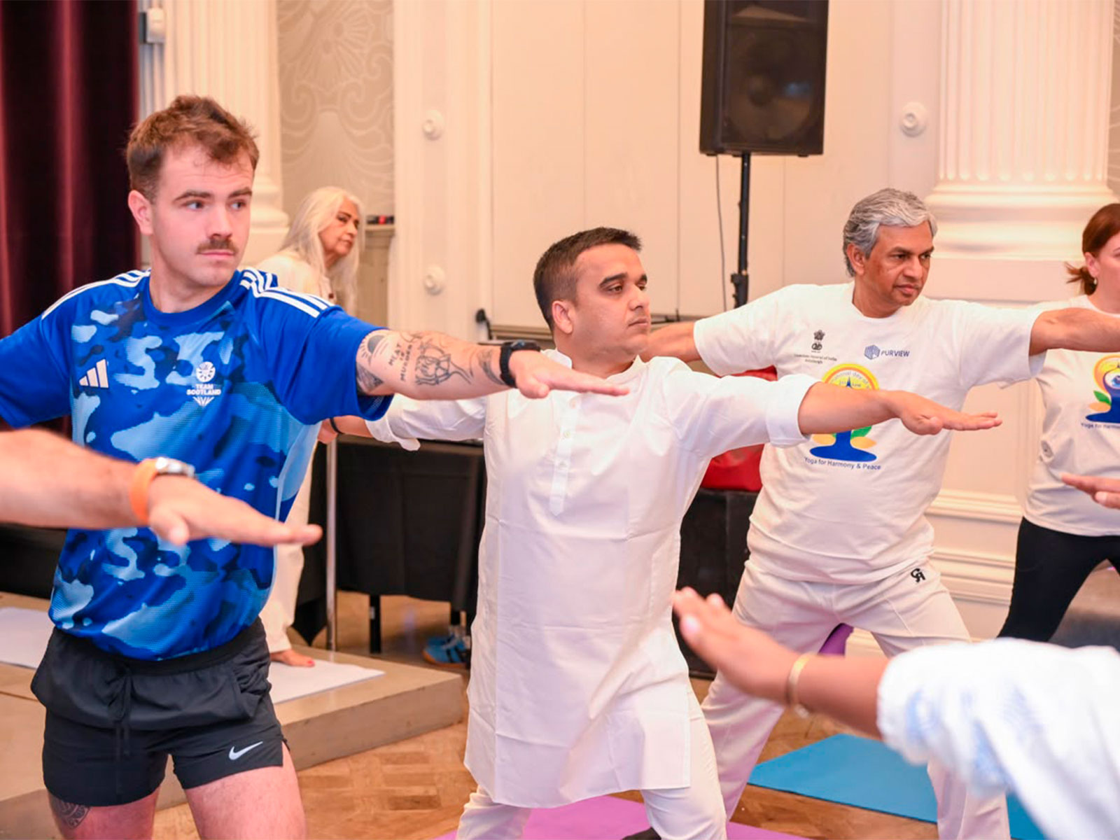 Gujarat Deputy Chief Minister Harsh Sanghavi performs Yoga session at Glasgow (Photo/Gujarat CMO) Gujarat Deputy Chief Minister Harsh Sanghavi performs Yoga session at Glasgow (Photo/Gujarat CMO)