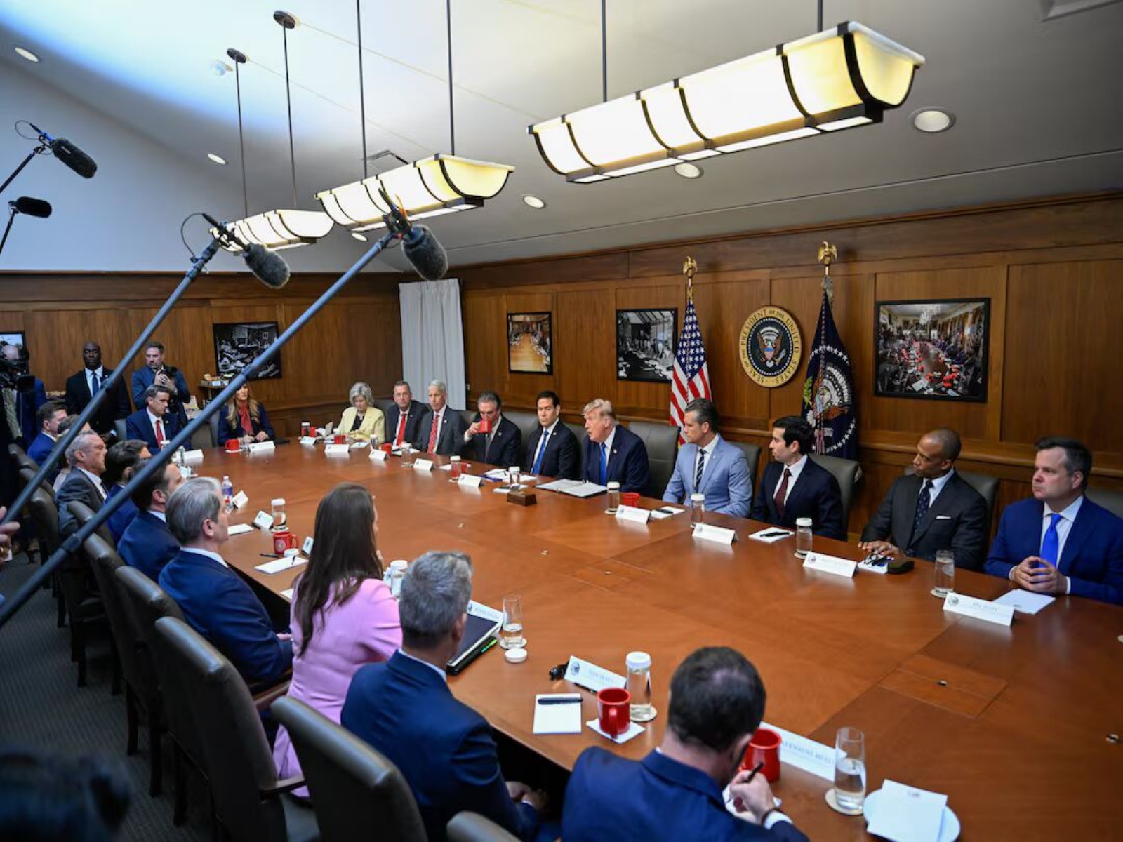 US President Donald Trump attends a Cabinet meeting alongside members of his administration at Camp David in Thurmont, Maryland, US. (Photo/Reuters)