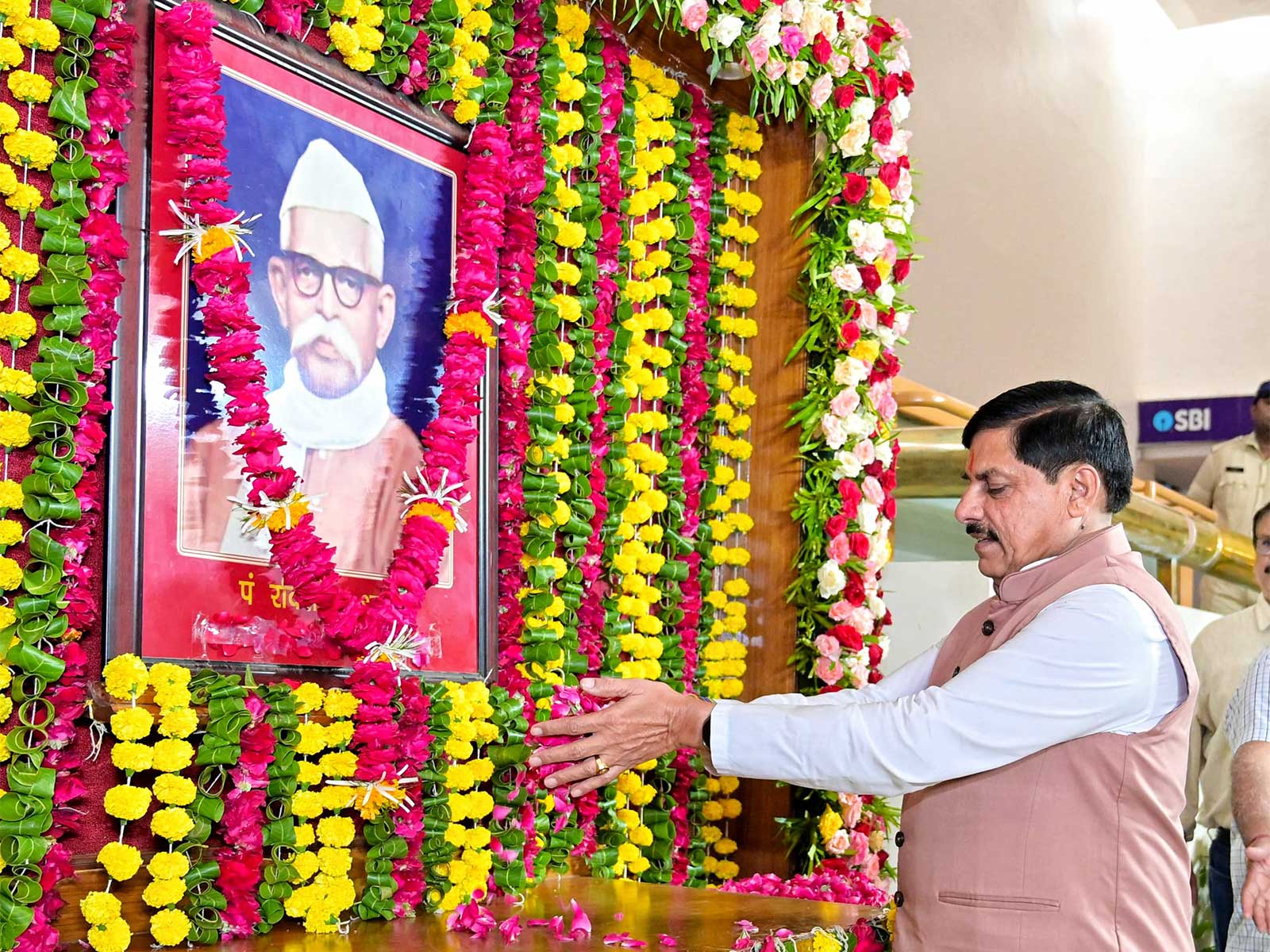 Madhya Pradesh Chief Minister Mohan Yadav pays floral tribute to late Ravishankar Shukla. (Photo X/Dr Mohan Yadav) Madhya Pradesh Chief Minister Mohan Yadav pays floral tribute to late Ravishankar Shukla. (Photo X/Dr Mohan Yadav)