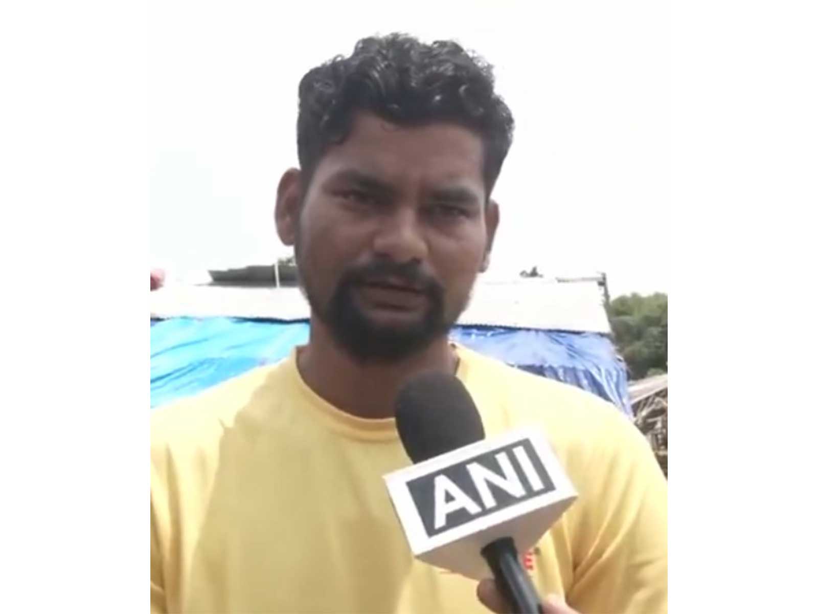 A local villager involved in rescue efforts in Sivasagar *Pho A local villager involved in rescue efforts in Sivasagar *Pho