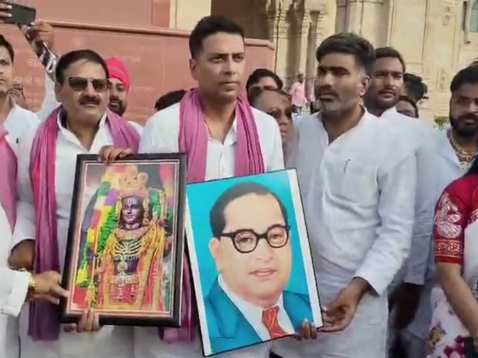 Samajwadi Party MLA Sachin Yadav protesting outside Assembly after his suspension (Photo/ANI) Samajwadi Party MLA Sachin Yadav protesting outside Assembly after his suspension (Photo/ANI)
