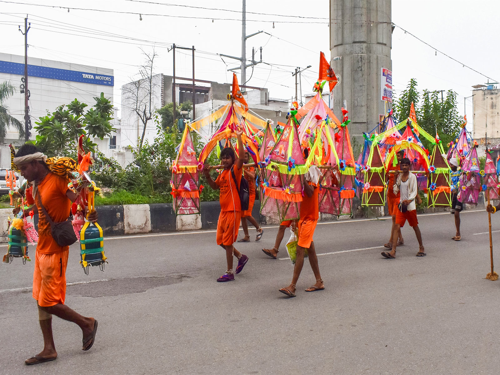 Devotees carry Ganga water in decorated kanwars during the ongoing Kanwar Yatra (Photo/ANI) Devotees carry Ganga water in decorated kanwars during the ongoing Kanwar Yatra (Photo/ANI)