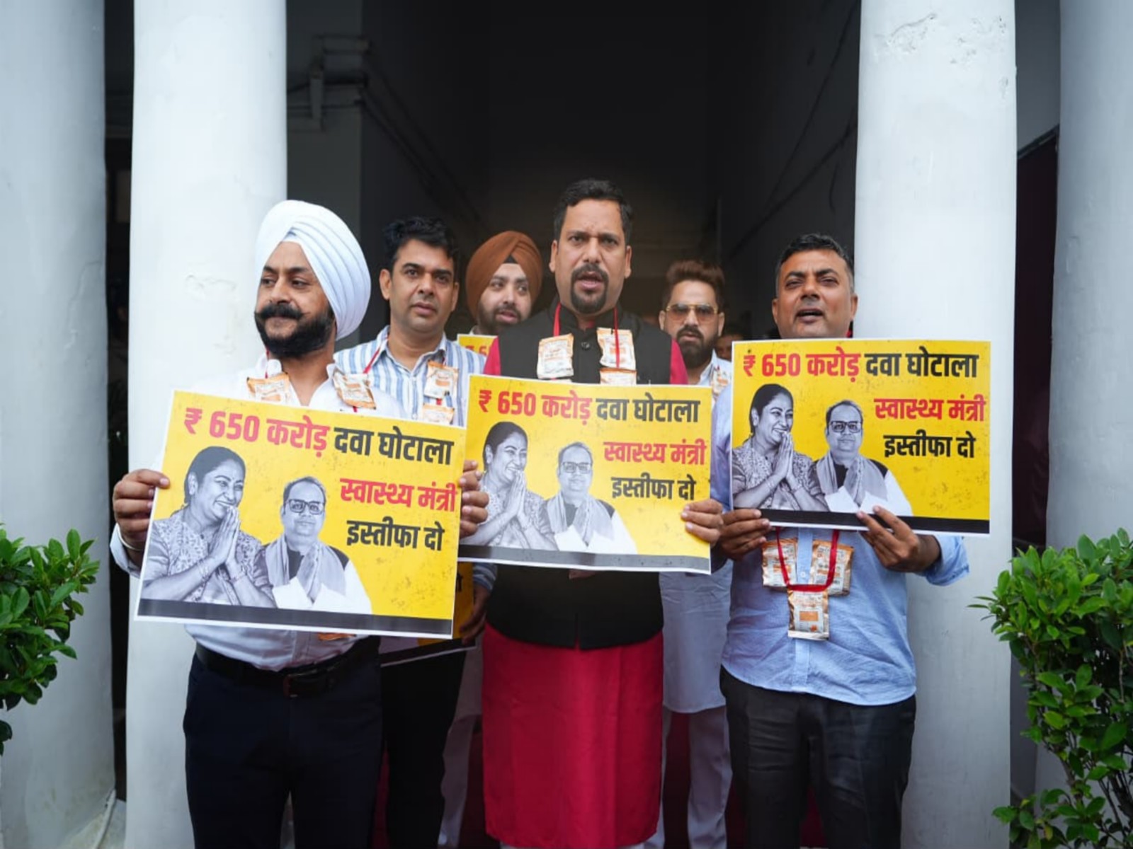 AAP MLAs protest at Delhi Assembly (Photo/ANI) AAP MLAs protest at Delhi Assembly (Photo/ANI)