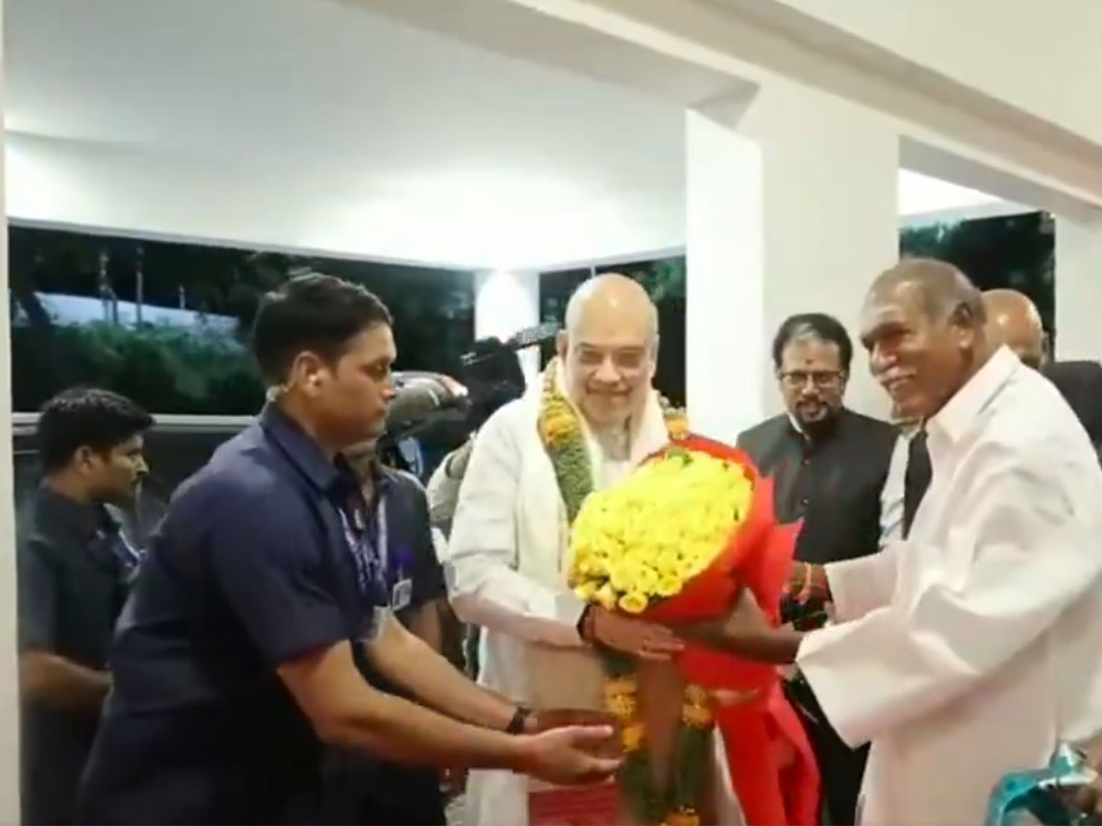 Amit Shah receives warm welcome by Puducherry CM N Rangasamy, Lieutenant Governor K Kailashnathan (Photo/ANI)