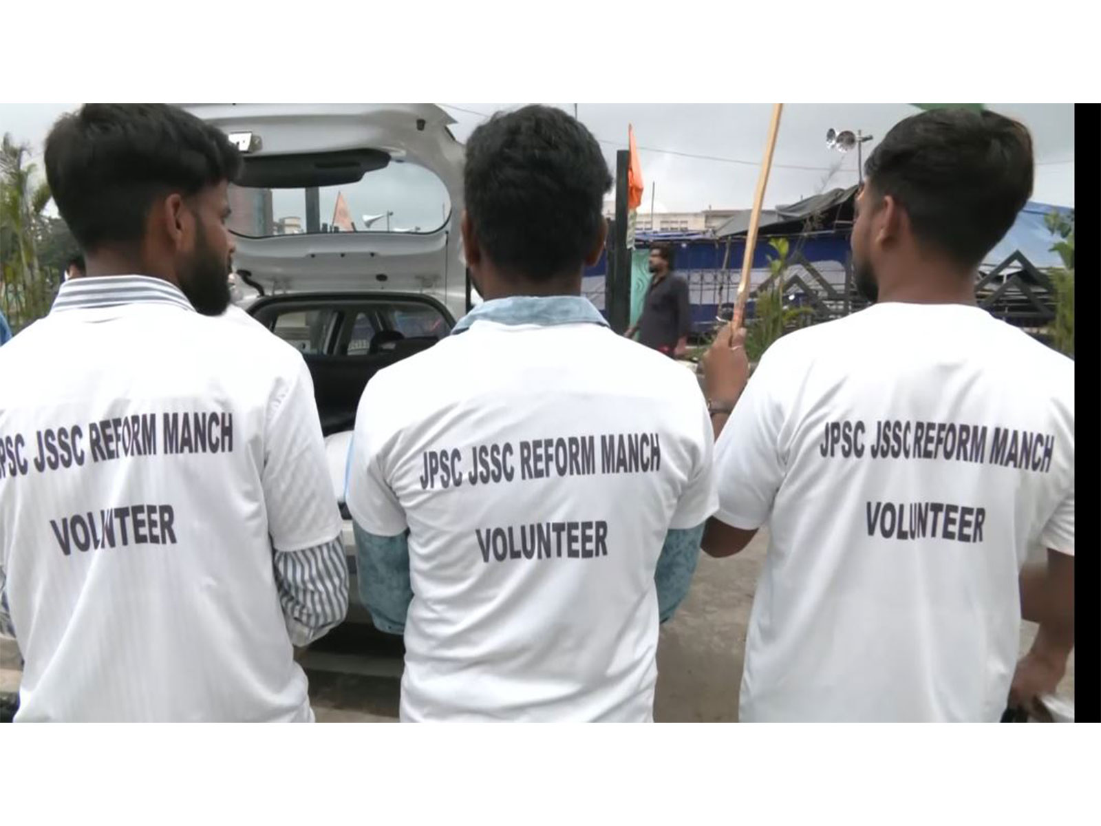 Volunteers wearing customized T-shirts printed with 